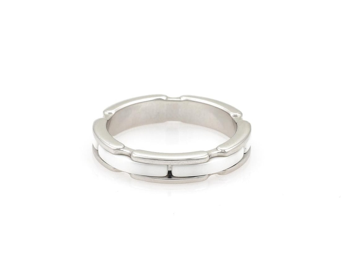 Chanel Ultra band ring in white ceramic and 18k white gold size 7.5: Chanel Ultra band ring in white ceramic and 18k white gold size 7.5 Pre-owned Chanel Ultra band ring crafted in 18k white gold and white ceramic. This signed ring features a polished white ceramic ban