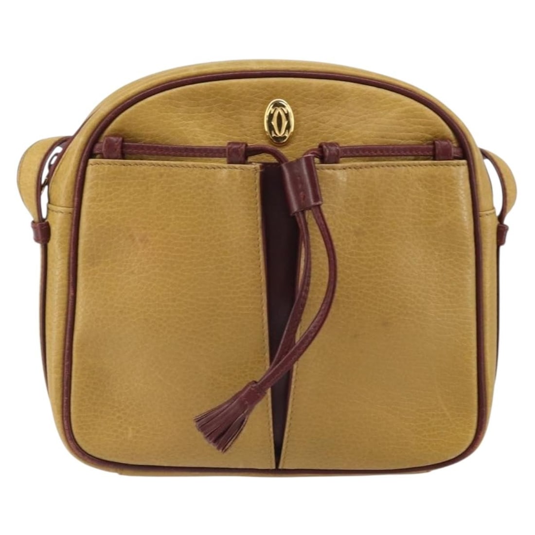 Cartier Must de Cartier Tasseled Leather Crossbody Bag Yellow: Cartier Must de Cartier Tasseled Leather Crossbody Bag Yellow This Cartier Tasseled Must de Cartier crossbody bag features a yellow leather exterior with a tassel accent. Designed for women, it includ