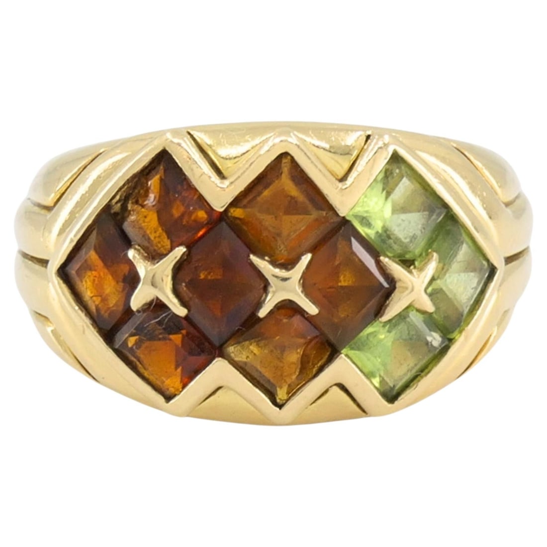 Bulgari 18k Yellow Gold Gemstone Ring with Citrine Peridot Tourmaline: Bulgari 18k Yellow Gold Gemstone Ring with Citrine Peridot Tourmaline Bvlgari gemstone ring crafted in 18k yellow gold, featuring a geometric arrangement of citrine, peridot, and tourmaline in mixed c