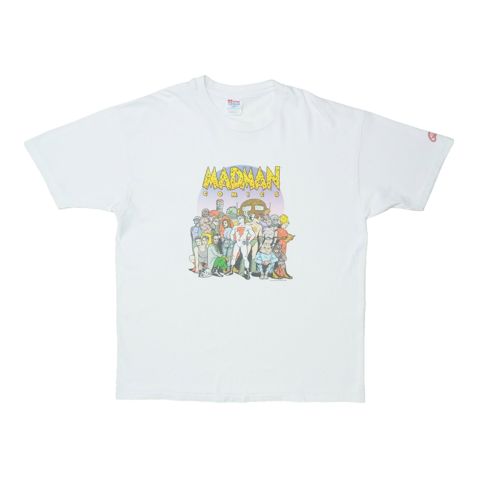 Vintage Madman Comics T Shirt White XL 1990s: Vintage Madman Comics T Shirt White XL 1990s Authentic vintage 1990s Madman Comics shirt in white cotton. This original tee is not a modern reproduction and is presented in good condition with no hole