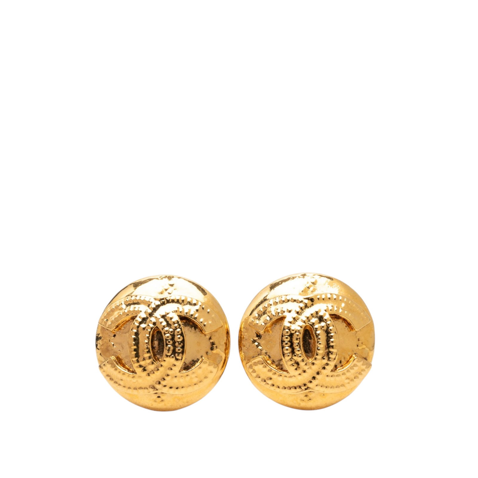Chanel CC Round Clip On Earrings Gold Plated Metal: Chanel CC Round Clip On Earrings Gold Plated Metal Gold tone clip-on earrings with round CC design and gold plated finish. Made in France, these costume earrings feature metal bodies and back clip-on 
