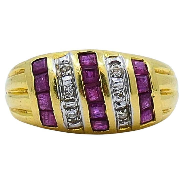 French 18k Gold Dome Ring with Ruby and Diamond Size 6.25: French 18k Gold Dome Ring with Ruby and Diamond Size 6.25 Vintage dome ring crafted in 18k yellow gold, featuring diamonds and rubies in a geometric channel-set design. The domed top presents three ro