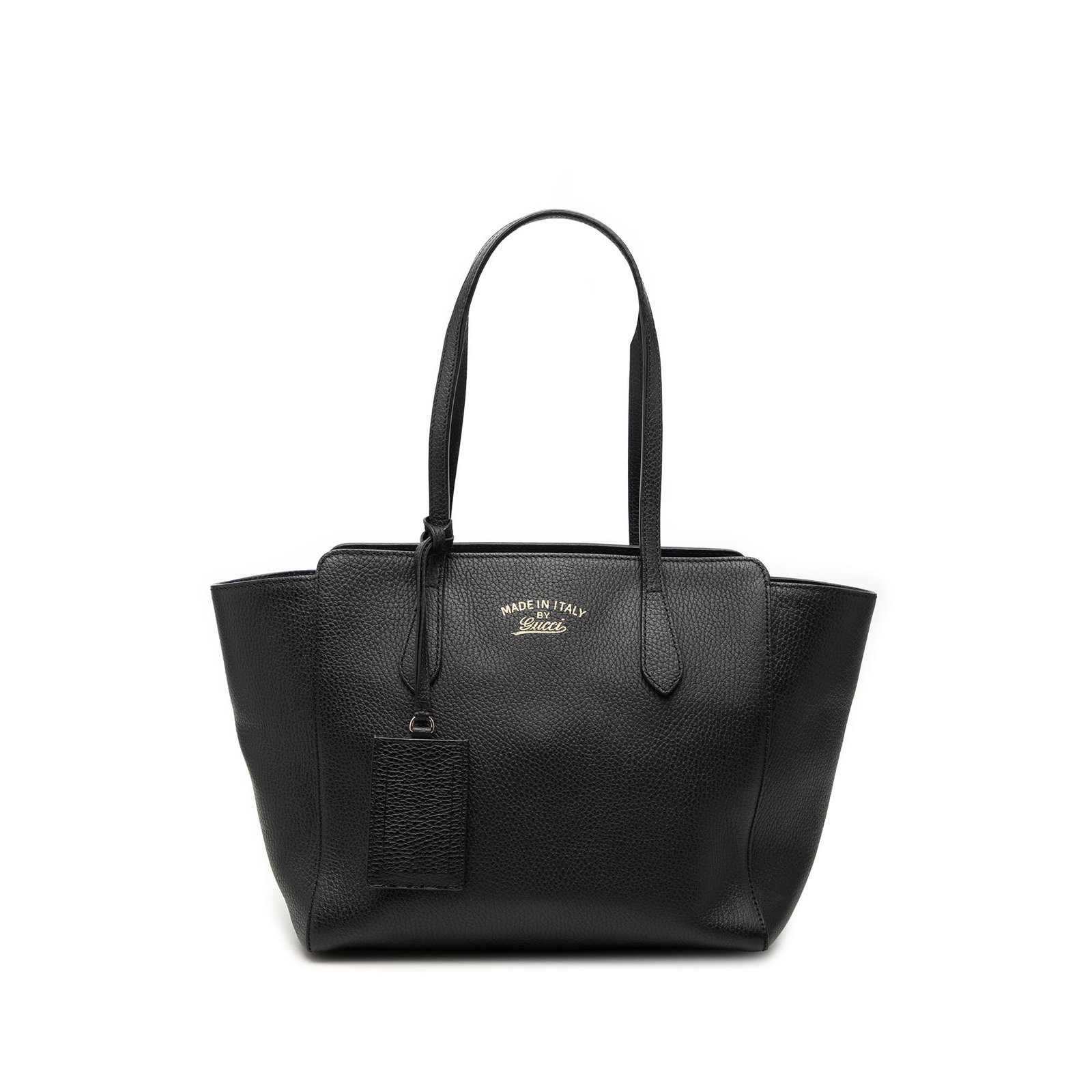 Gucci Swing Tote Small Black Calfskin Leather Handbag: Gucci Swing Tote Small Black Calfskin Leather Handbag Gucci Small Calfskin Swing Tote in black leather with flat leather straps, an open top with magnetic closure, and interior zip and slip pockets. M
