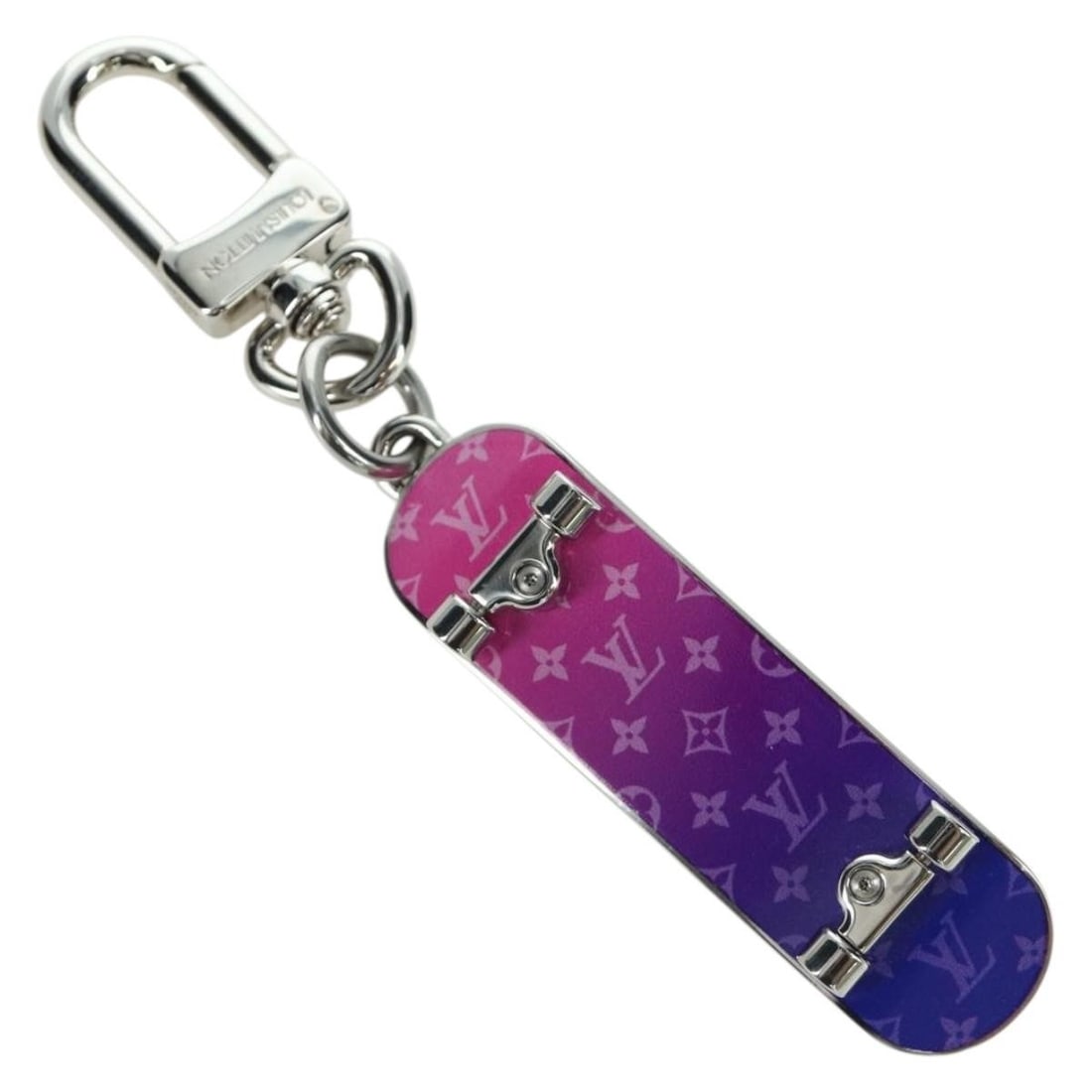 Louis Vuitton MP3269 skateboard bag charm silver tone metal: Louis Vuitton MP3269 skateboard bag charm silver tone metal Louis Vuitton Bijoux Sac Skate Board charm in silver-tone metal. This women's charm is made in Italy and comes with a dust bag and item box.