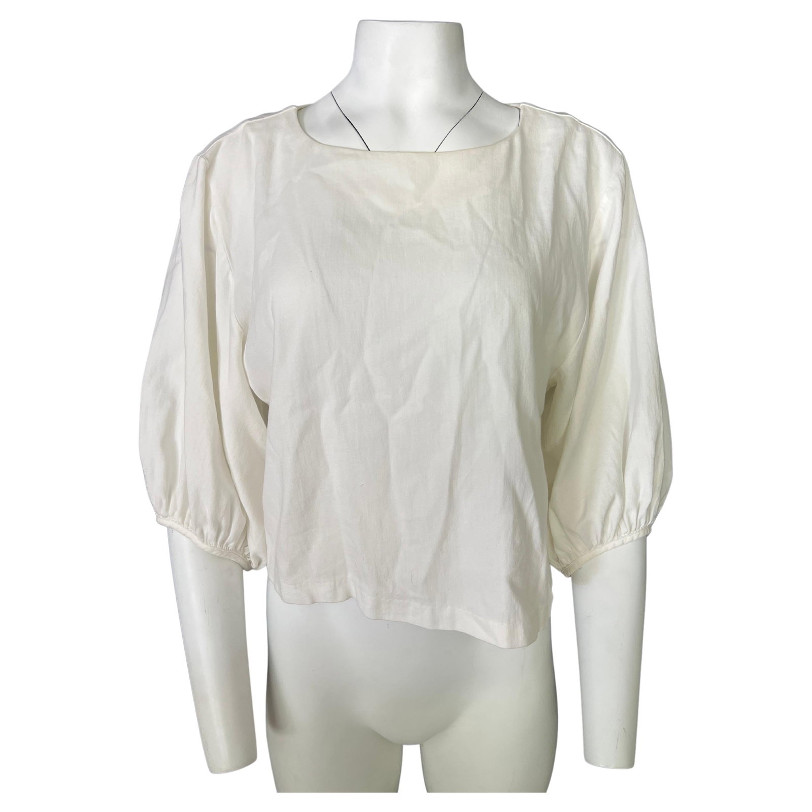 Antipast Size 2 Cotton Blouse with Balloon 3 4 Sleeves: Antipast Size 2 Cotton Blouse with Balloon 3 4 Sleeves White cotton blouse top with a crew neckline, balloon 3/4 length sleeves, and a rear button closure. Made in Japan, this piece is marked size 2 (