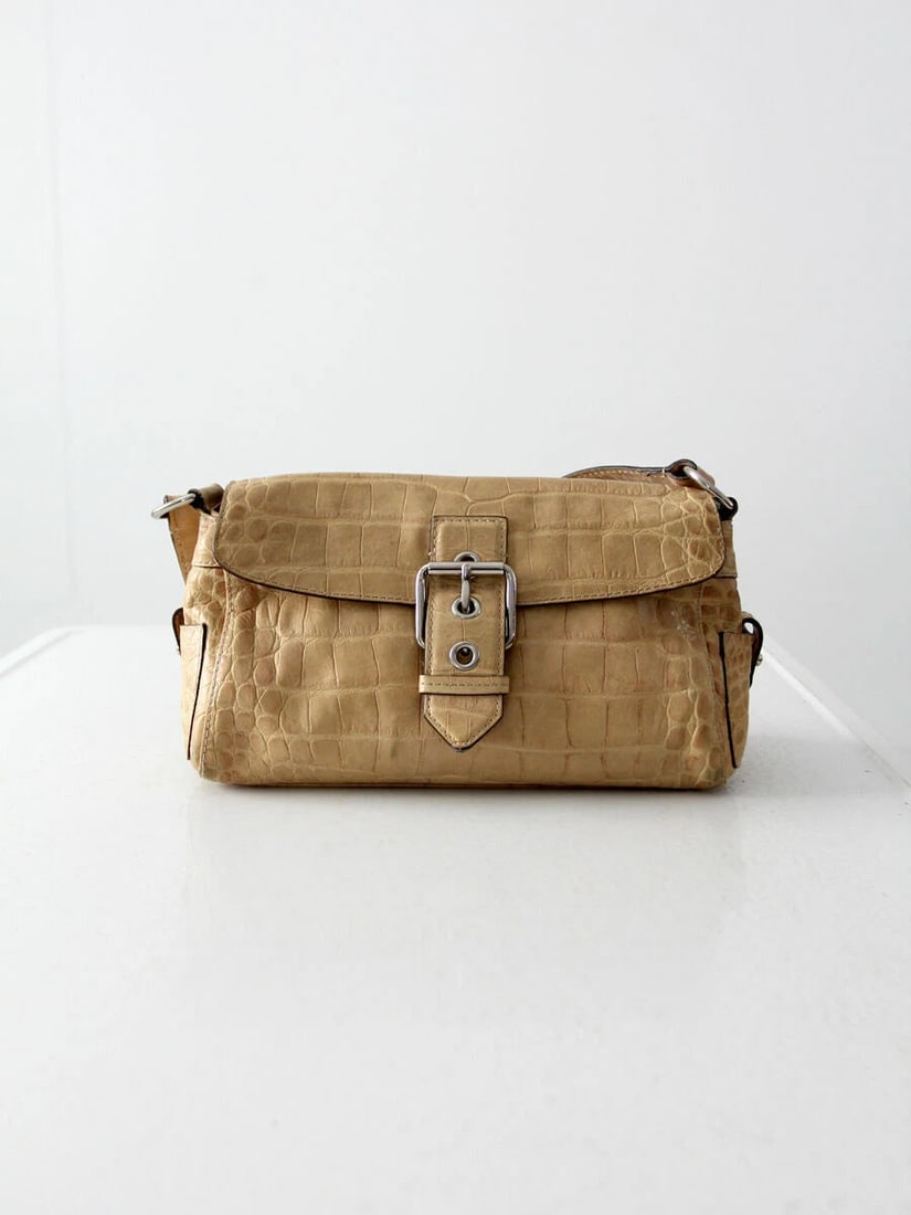 Dooney & Bourke Vintage Alligator Print Leather Satchel Handbag: Dooney & Bourke Vintage Alligator Print Leather Satchel Handbag Enhance your style with this stunning vintage Dooney & Bourke satchel. Made from luxurious beige alligator-embossed leather, this handba