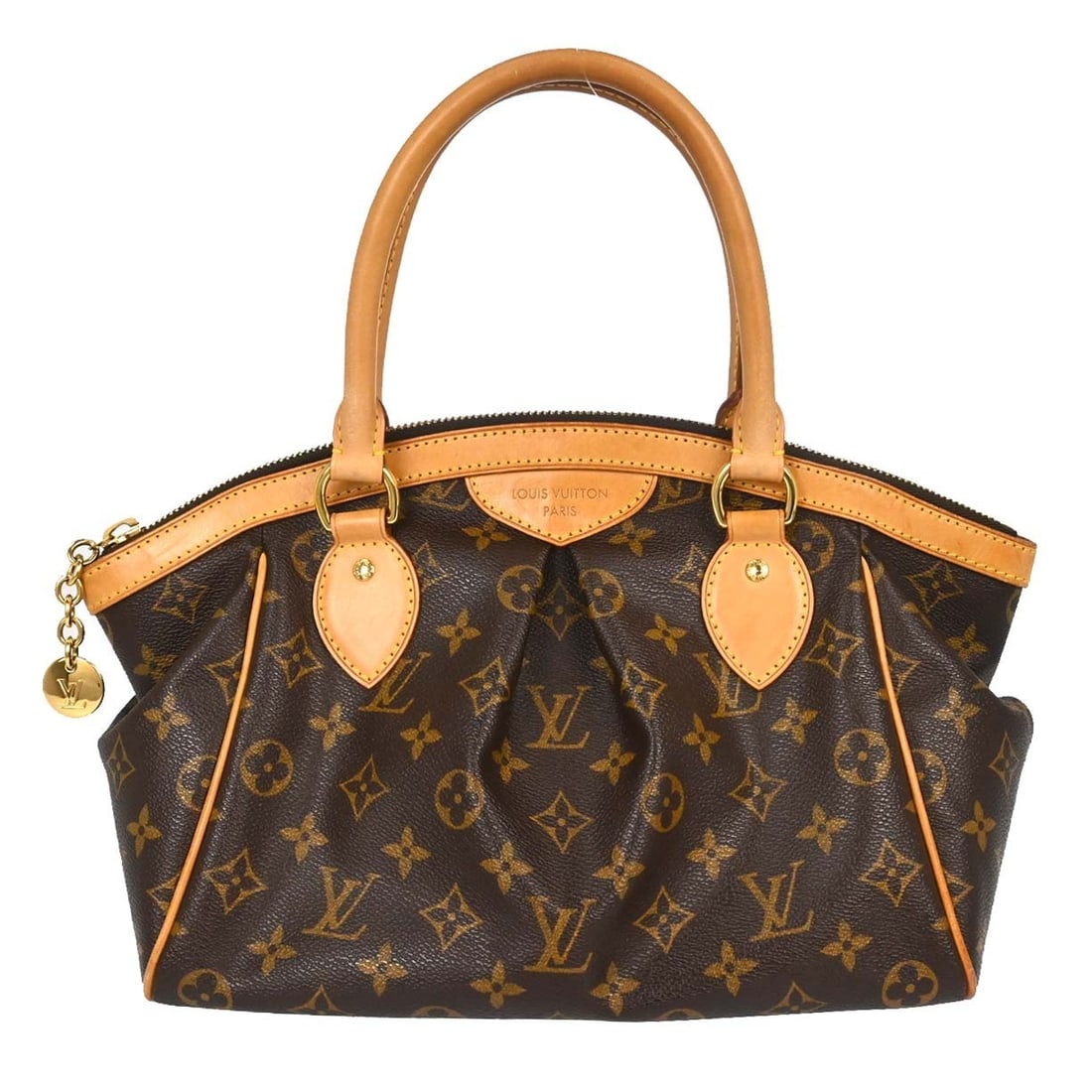Louis Vuitton Tivoli Handbag Brown Monogram Canvas: Louis Vuitton Tivoli Handbag Brown Monogram Canvas Louis Vuitton Tivoli Monogram handbag in brown canvas. This women's bag is made in France and remains in good condition, showing corner wear on the e