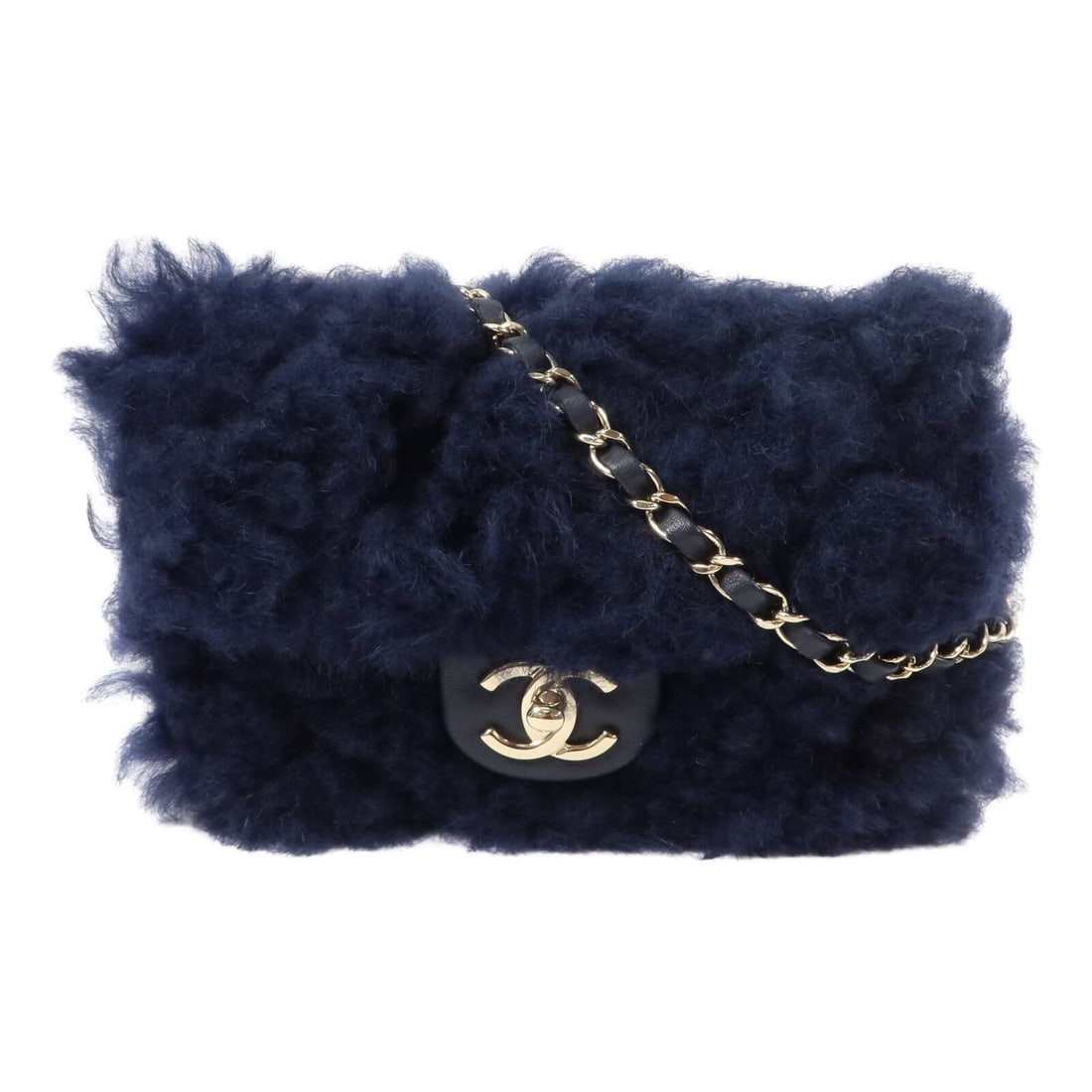 CHANEL AS1199 Mini Flap Shoulder Bag Navy Wool Lambskin GHW: CHANEL AS1199 Mini Flap Shoulder Bag Navy Wool Lambskin GHW Mini flap shoulder bag in navy wool and lambskin leather with a chain strap and CC turn-lock closure. The interior includes one open pocket 