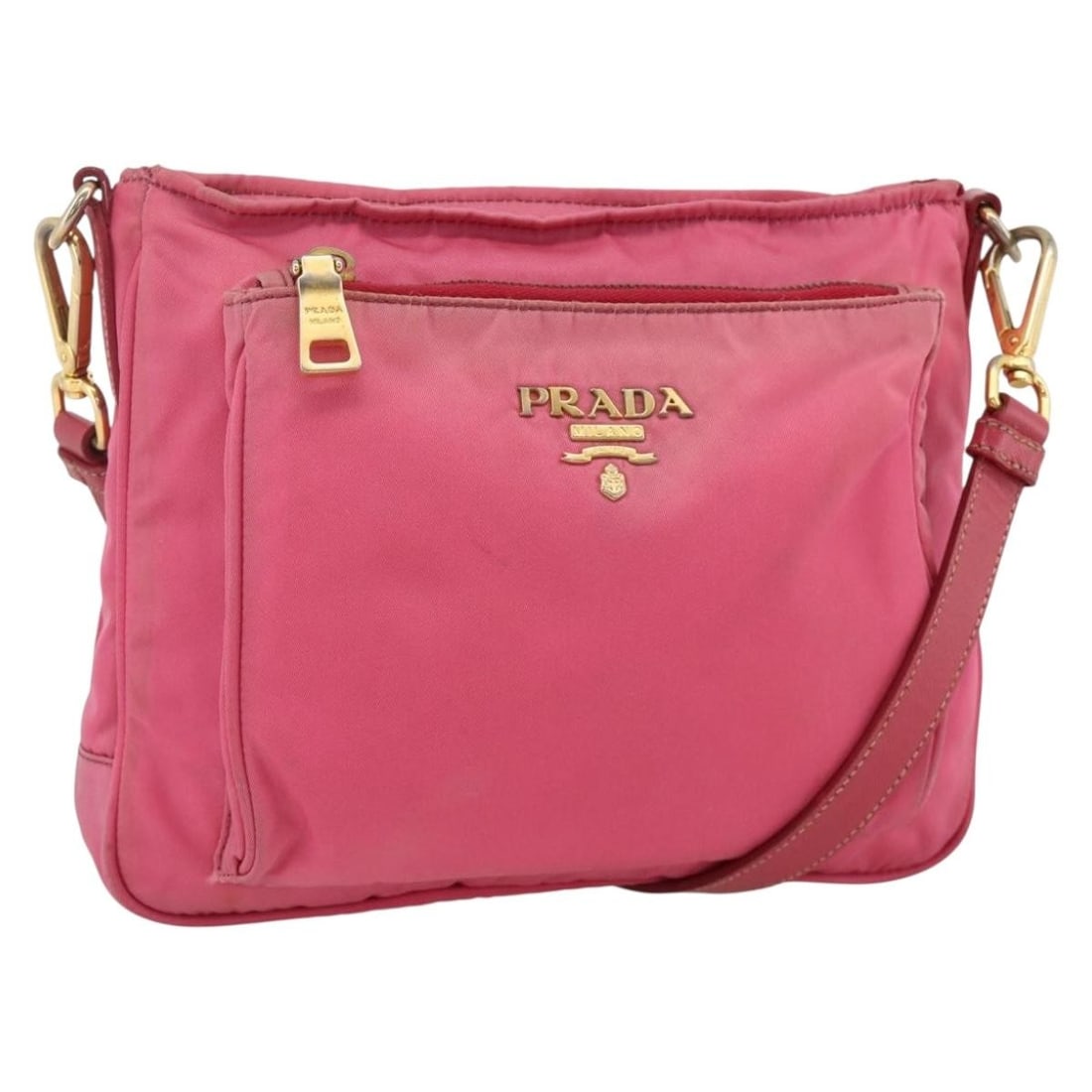Prada Pink Gold Nylon Shoulder Purse YKZ524: Prada Pink Gold Nylon Shoulder Purse YKZ524 A Prada shoulder bag in pink and gold, made from nylon and crafted in Turkey. It features a shoulder strap with an approximate drop of 50 to 57 cm. The bag 