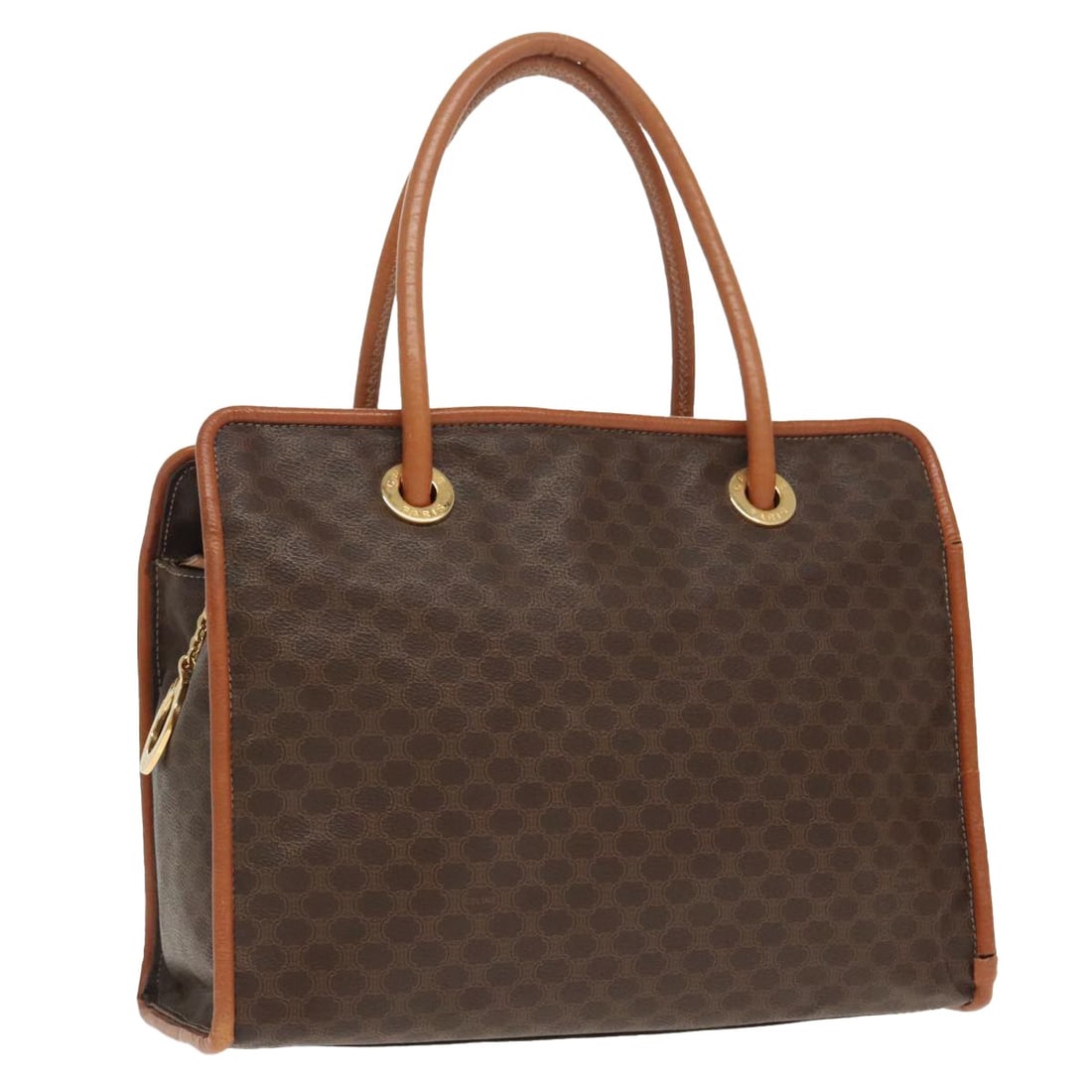 Celine Macadam Brown PVC Leather Tote with Gold Accents: Celine Macadam Brown PVC Leather Tote with Gold Accents This CELINE Macadam Canvas tote bag features a brown and gold design with PVC leather and canvas materials. The bag is designed for women and of