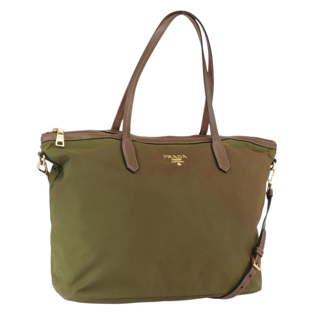PRADA Khaki Nylon Tote Bag with Gold Tone Leather Trim: PRADA Khaki Nylon Tote Bag with Gold Tone Leather Trim Prada tote bag in khaki nylon with leather trim and gold-tone accents. Made in Italy, this women's bag has a roomy tote silhouette with shoulder 