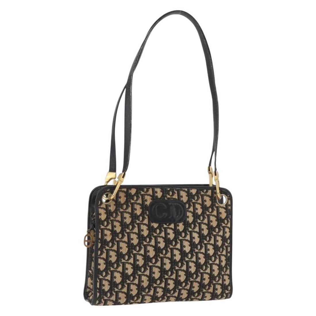 Christian Dior Trotter Shoulder Bag in Navy Gold Canvas: Christian Dior Trotter Shoulder Bag in Navy Gold Canvas Christian Dior shoulder bag in navy and gold Trotter canvas, made in France. This women's bag is offered without the original box or dust bag an