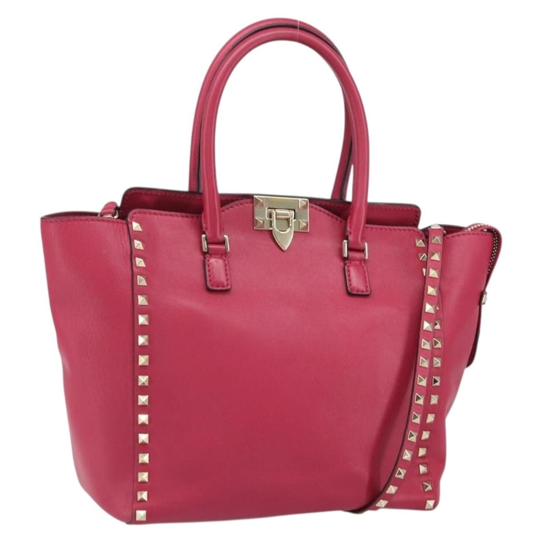 Pink Leather Valentino Rockstud 2way Handbag with Gold Accents and Shoulder Strap: Pink Leather Valentino Rockstud 2way Handbag with Gold Accents and Shoulder Strap This Valentino Rock Studs handbag features a two-way design crafted from pink and gold leather. It includes both a top