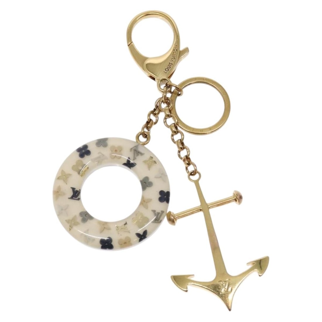 Louis Vuitton Marina Charm Gold Plastic M66141: Louis Vuitton Marina Charm Gold Plastic M66141 This Louis Vuitton Porte Cles Marina Charm is crafted from durable plastic in a gold tone, designed as a stylish accessory for women. The charm measures 