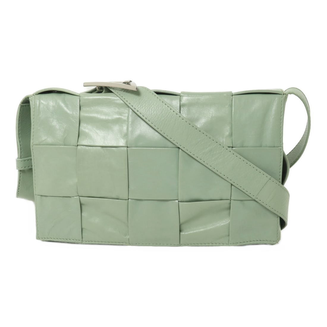 Bottega Veneta Cassette Green Calfskin Shoulder Bag with Silver Tone Hardware: Bottega Veneta Cassette Green Calfskin Shoulder Bag with Silver Tone Hardware Bottega Veneta Cassette Shoulder Bag in light green calfskin leather with silver-tone hardware. It features a magnetic poc