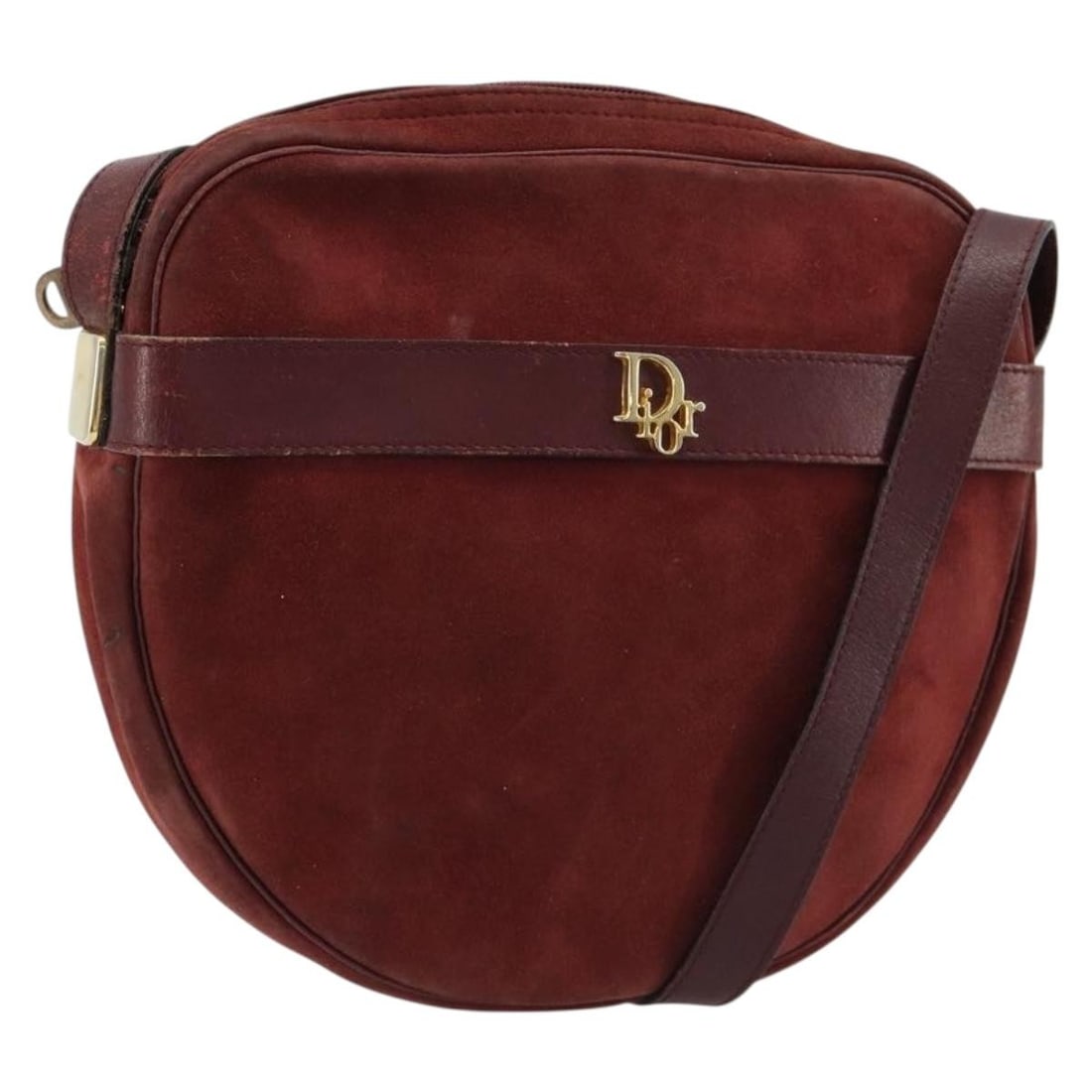 Christian Dior suede shoulder bag in bordeaux with gold tone: Christian Dior suede shoulder bag in bordeaux with gold tone Christian Dior shoulder bag in bordeaux suede with gold-tone accents, made in France. This women's bag features a compact silhouette with a