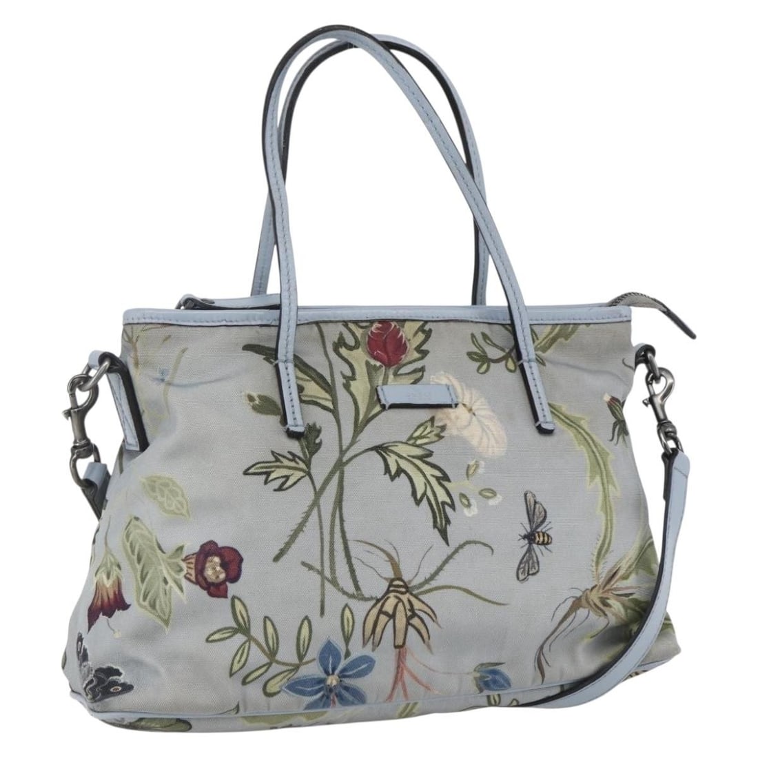 Gucci Flora Pattern Canvas Convertible Tote Bag with Zipper: Gucci Flora Pattern Canvas Convertible Tote Bag with Zipper This pre-owned Gucci Convertible Zip Tote features the iconic Flora canvas design in blue. Designed for women, the bag offers both handle an