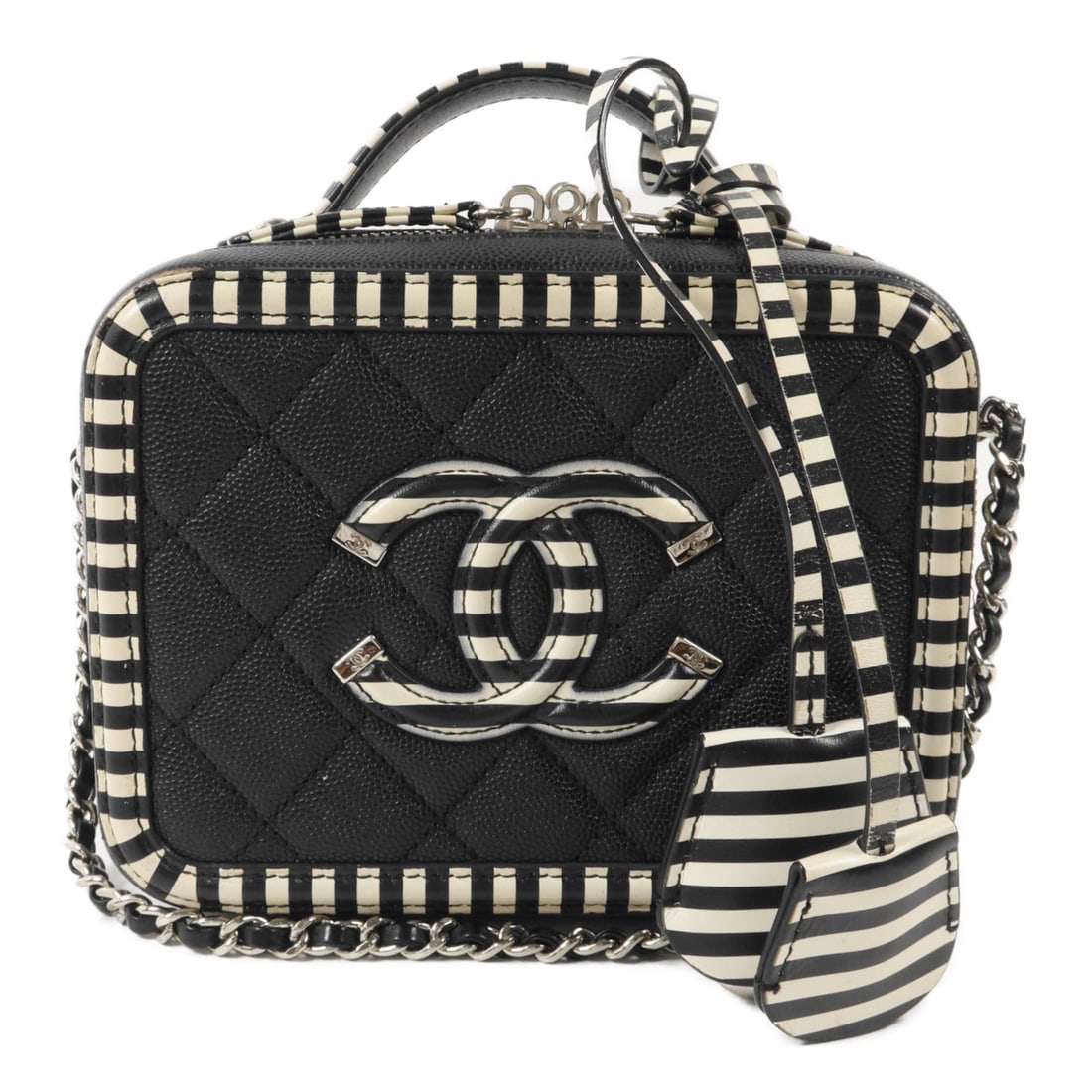 CHANEL A93342 CC vanity shoulder bag in black white calfskin: CHANEL A93342 CC vanity shoulder bag in black white calfskin Chanel vanity case 2-way shoulder bag in black and white calfskin leather. This women's bag features a structured compact silhouette with a