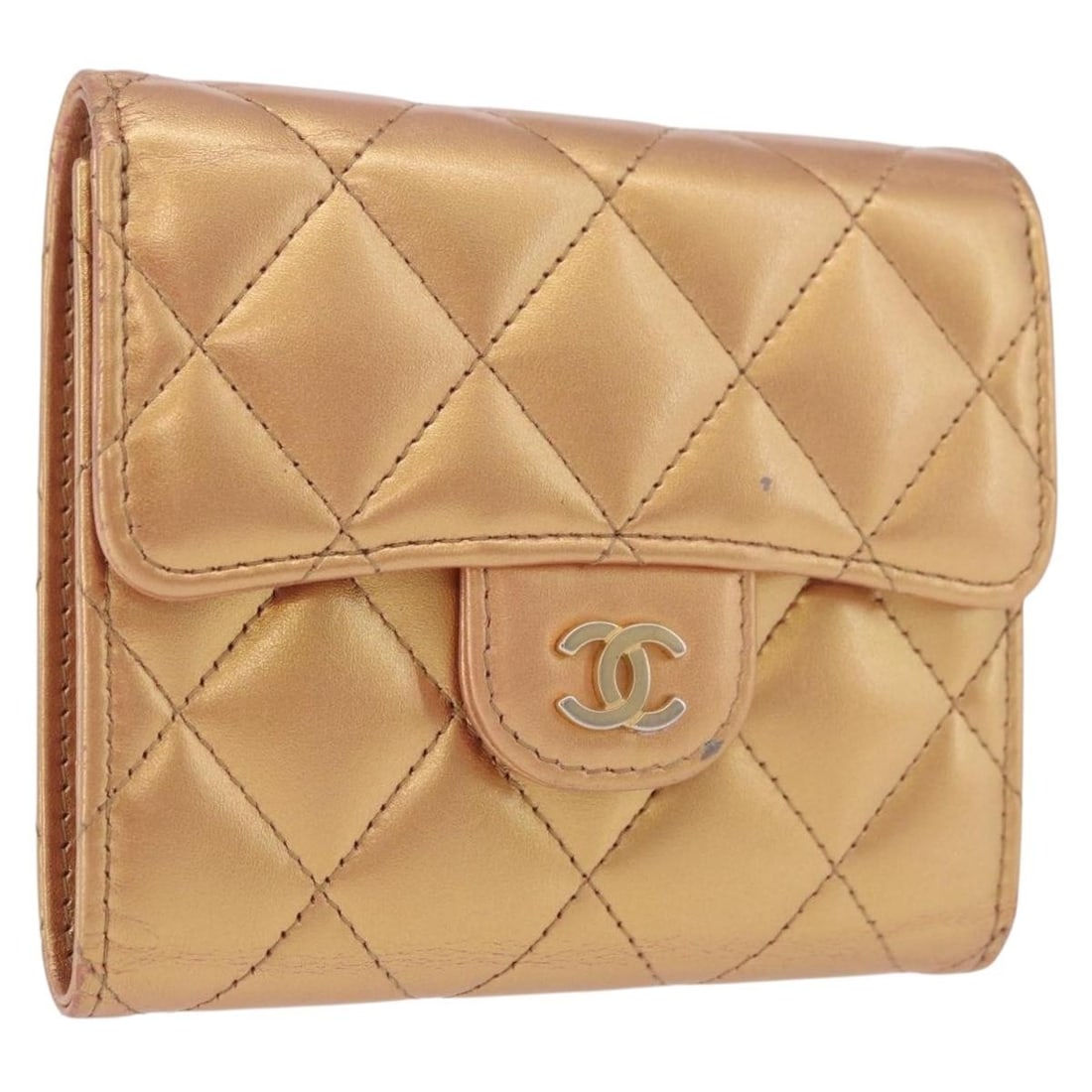 CHANEL CC Compact Wallet Gold Lamb Skin with Box: CHANEL CC Compact Wallet Gold Lamb Skin with Box Compact matelasse wallet in gold lamb skin with CC detailing. Made in France, this women's wallet includes the item box. Condition is heavily used, wit