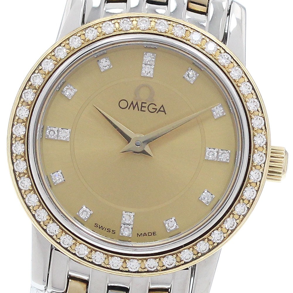 Omega De Ville Ref 4375.15 Womens Quartz Diamond Bezel Watch: Omega De Ville Ref 4375.15 Womens Quartz Diamond Bezel Watch Pre-owned OMEGA De Ville women's wristwatch with a diamond bezel and quartz movement. This watch-only piece features a gold-tone dial and a