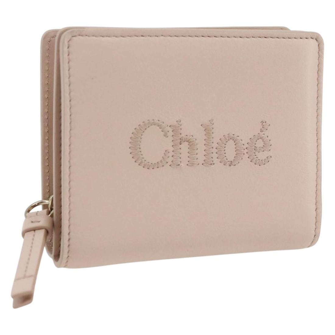 Chloe Sense Leather Wallet in Pink and Gold: Chloe Sense Leather Wallet in Pink and Gold Compact Chloe Sense wallet in pink leather with gold-tone accents. Made in Spain for women, this wallet is offered without the original box or dust bag; onl
