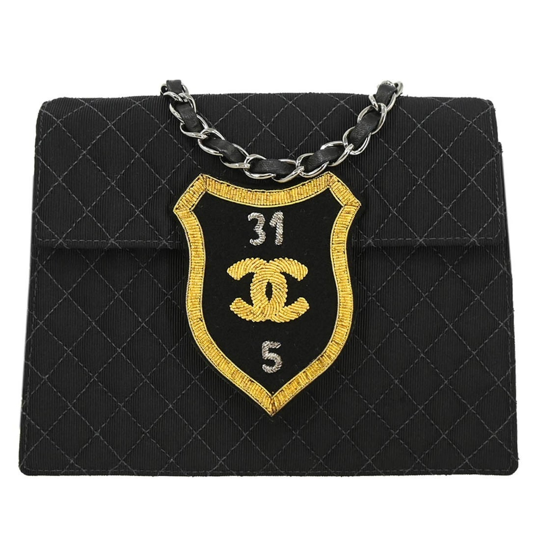 CHANEL Quilted Emblem Shoulder Bag Black Canvas Chain Strap: CHANEL Quilted Emblem Shoulder Bag Black Canvas Chain Strap Small Chanel shoulder bag in black canvas with a matelasse quilted design and push-lock flap closure. This women's bag features a black chai