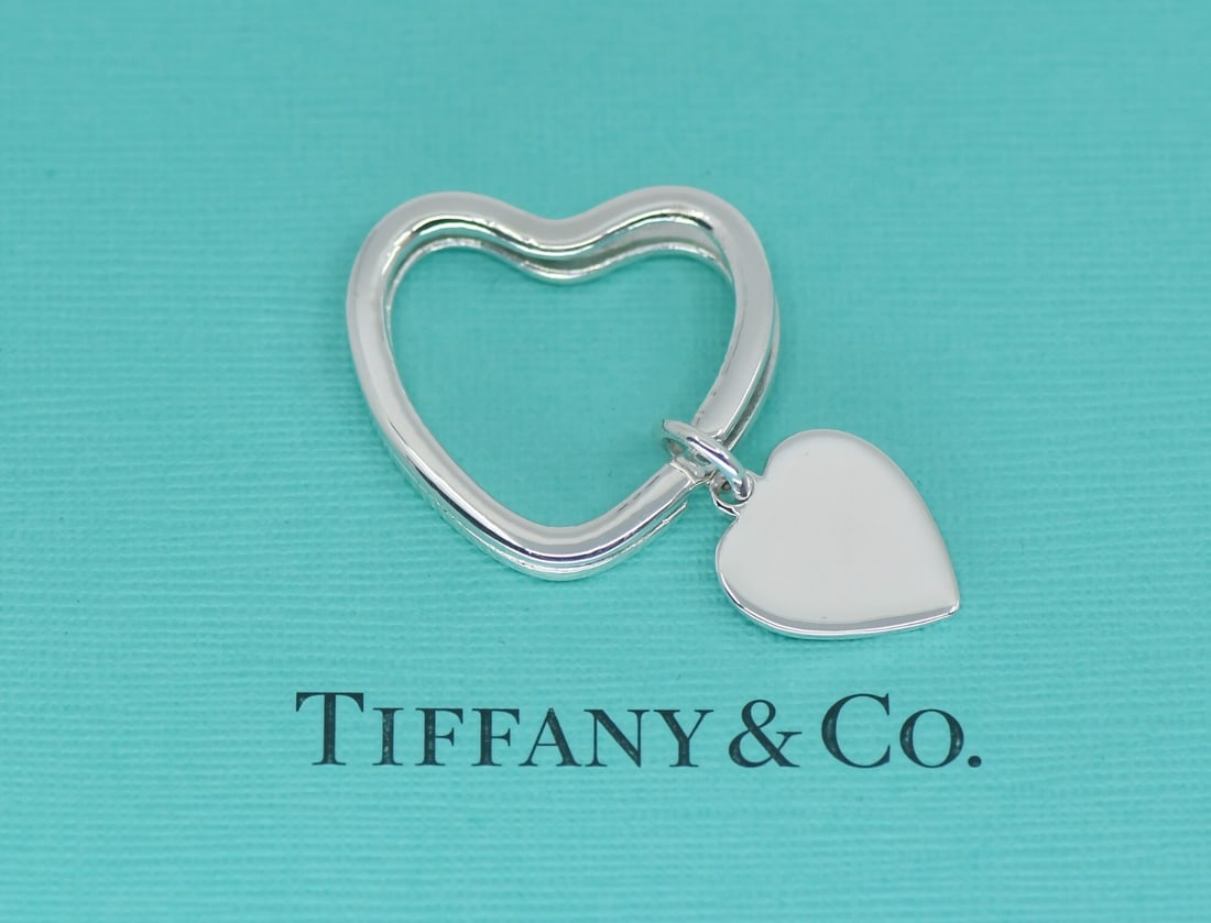 Sterling Silver 26x26mm Open Heart Pendant by Tiffany & Co Italy: Sterling Silver 26x26mm Open Heart Pendant by Tiffany & Co Italy This Tiffany & Co. Open Heart pendant is crafted from 925 sterling silver and features a classic open heart design. The pendant is pre-