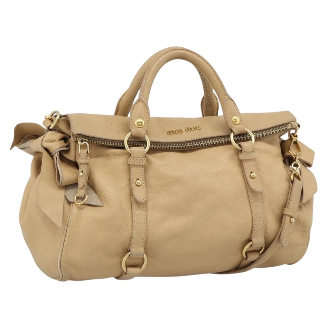 Miu Miu Convertible Satchel Beige Leather Handbag: Miu Miu Convertible Satchel Beige Leather Handbag A Miu Miu convertible satchel in beige leather with a unisex design. This pre-owned bag remains in good overall condition with visible wear consistent