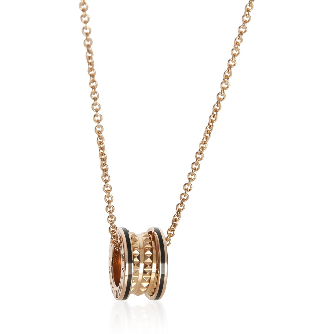 BVLGARI B.zero1 Rock 18k Rose Gold Ceramic Necklace: BVLGARI B.zero1 Rock 18k Rose Gold Ceramic Necklace This BVLGARI B.zero1 Rock necklace features a sophisticated design crafted from 18k rose gold and ceramic. The necklace is designed for a unisex fit
