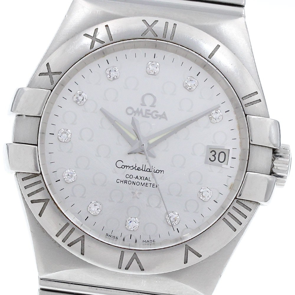 Omega Constellation 123.10.35.20.52.002 mens steel diamond wristwatch: Omega Constellation 123.10.35.20.52.002 mens steel diamond wristwatch Pre-owned Omega Constellation wristwatch with automatic Co-Axial chronometer movement and an 11P diamond silver dial. This men's w