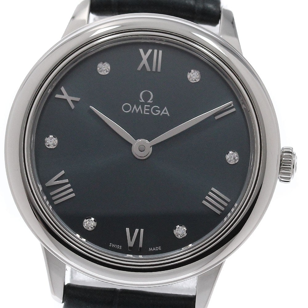 Omega De Ville Prestige 434.13.28.60.60.001 Quartz Women's Diamond Watch: Omega De Ville Prestige 434.13.28.60.60.001 Quartz Women's Diamond Watch Pre-owned OMEGA De Ville Prestige ladies wristwatch with a quartz movement and a green dial accented by 6 diamonds. This watch 