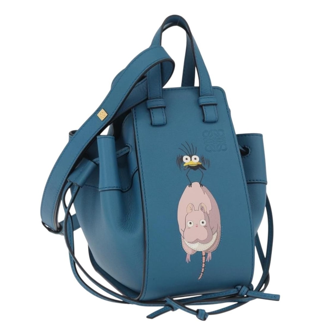 LOEWE Hammock Drawer Sling Blue Leather Ghibli Spirited Away Bag: LOEWE Hammock Drawer Sling Blue Leather Ghibli Spirited Away Bag LOEWE x Ghibli Spirited Away Hammock Drawer Sling handbag in blue leather. This women's bag includes a dust bag and shoulder strap. Mad