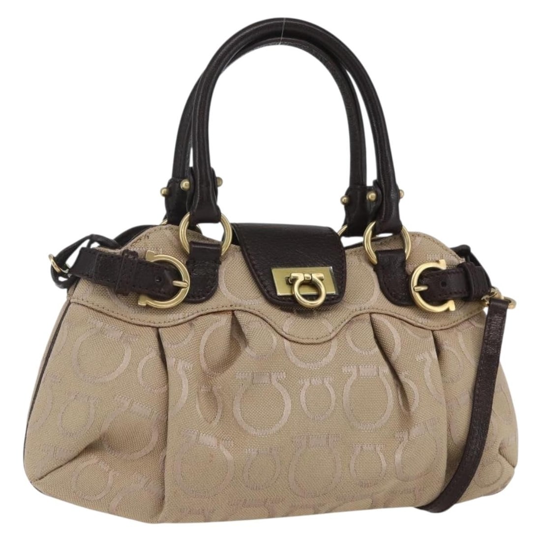 Beige Leather Canvas Gancini Shoulder Handbag by Salvatore Ferragamo with Strap: Beige Leather Canvas Gancini Shoulder Handbag by Salvatore Ferragamo with Strap This Salvatore Ferragamo Gancini handbag features a beige and gold leather exterior with a two-way design for versatile 