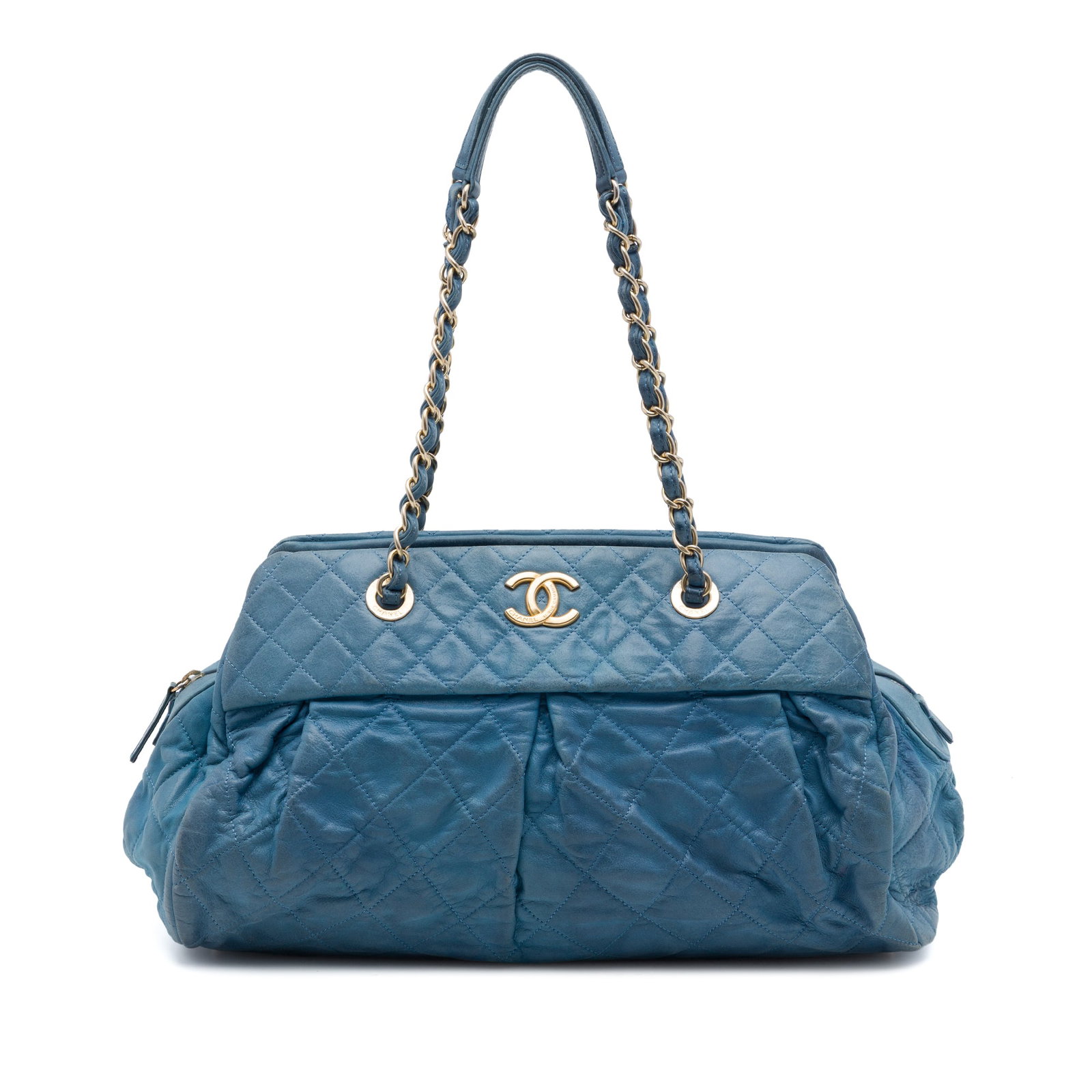 Chanel Chic Quilt Bowling Bag Blue Iridescent Quilted Calfskin: Chanel Chic Quilt Bowling Bag Blue Iridescent Quilted Calfskin This Chanel Chic Quilt Bowling Bag is crafted from quilted iridescent calfskin leather and features leather-woven chain link straps, a to