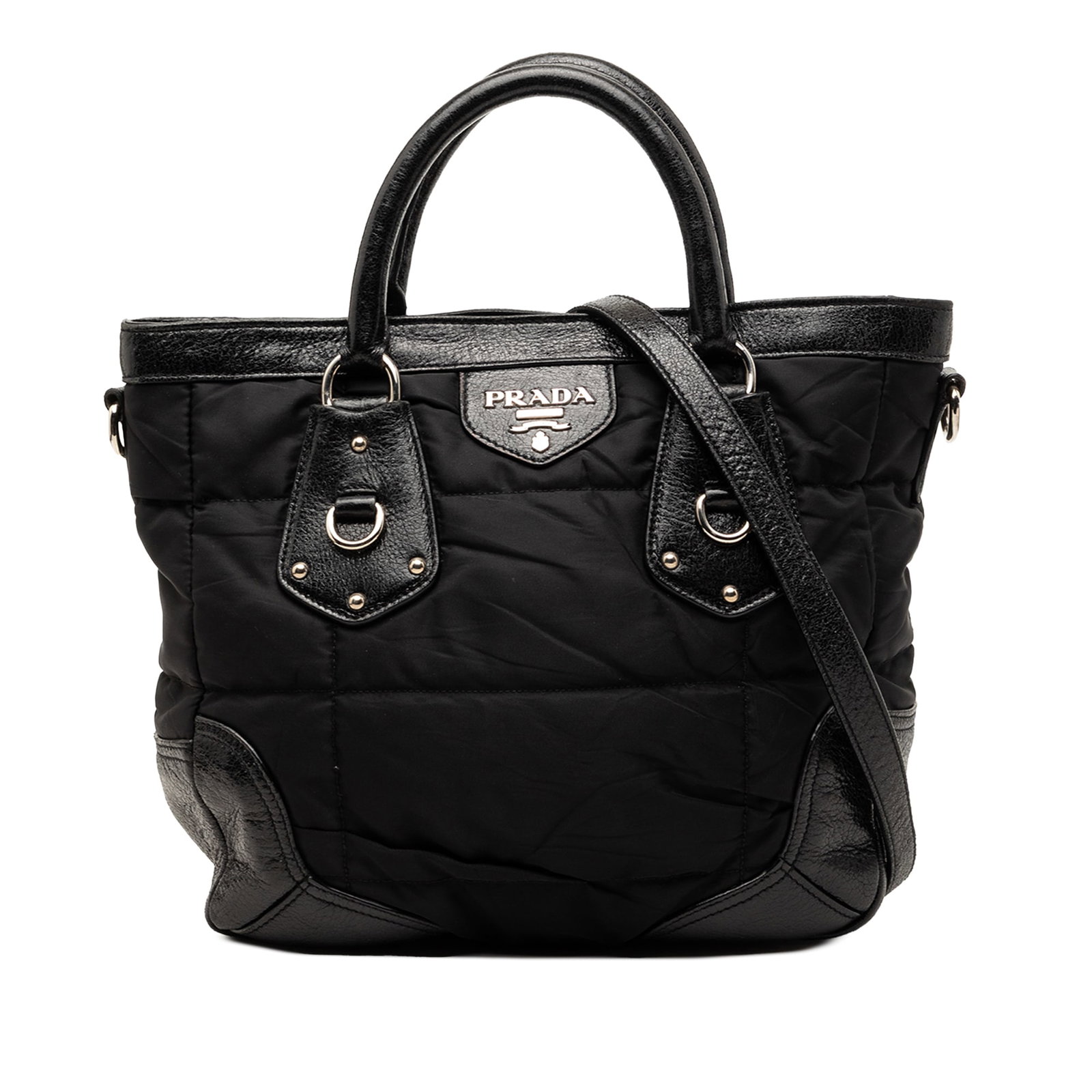 Prada Black Nylon Cervo Trim 24H Tote: Prada Black Nylon Cervo Trim 24H Tote This Prada Tessuto Cervo Lux 24H Tote is crafted from durable nylon with deerskin leather trim and features rolled leather handles and a detachable flat leather s