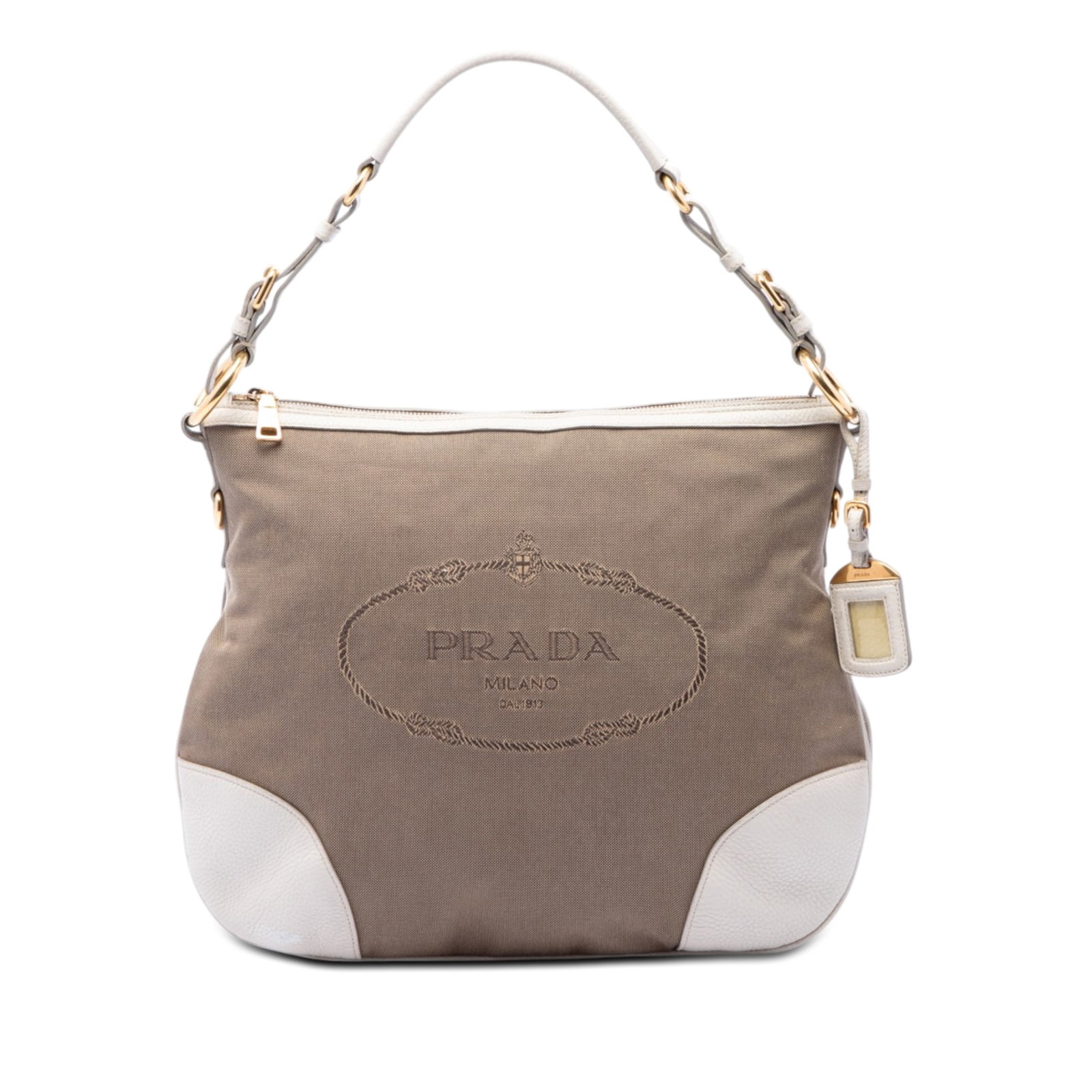 Prada Canapa Logo Canvas Shoulder Bag with Leather Trim: Prada Canapa Logo Canvas Shoulder Bag with Leather Trim Prada Canvas Canapa Logo Shoulder Bag crafted with a canvas body and leather trim. The bag features a flat leather shoulder strap, a top zip clo