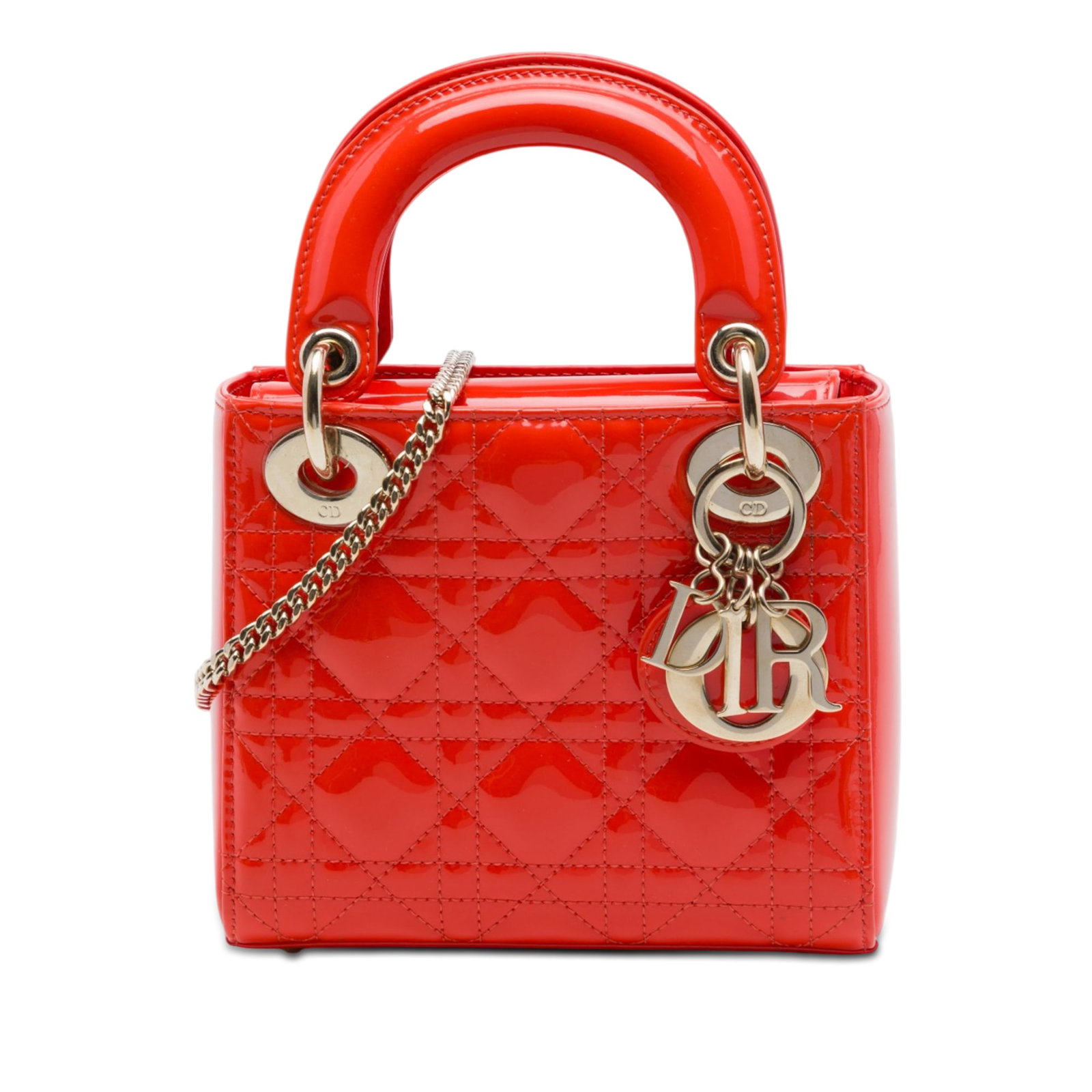 Dior Lady Dior Mini Cannage Patent Leather Bag Orange: Dior Lady Dior Mini Cannage Patent Leather Bag Orange Mini Lady Dior bag in orange patent leather with Cannage quilting. This Italian-made bag features flat top handles, a detachable chain strap with 