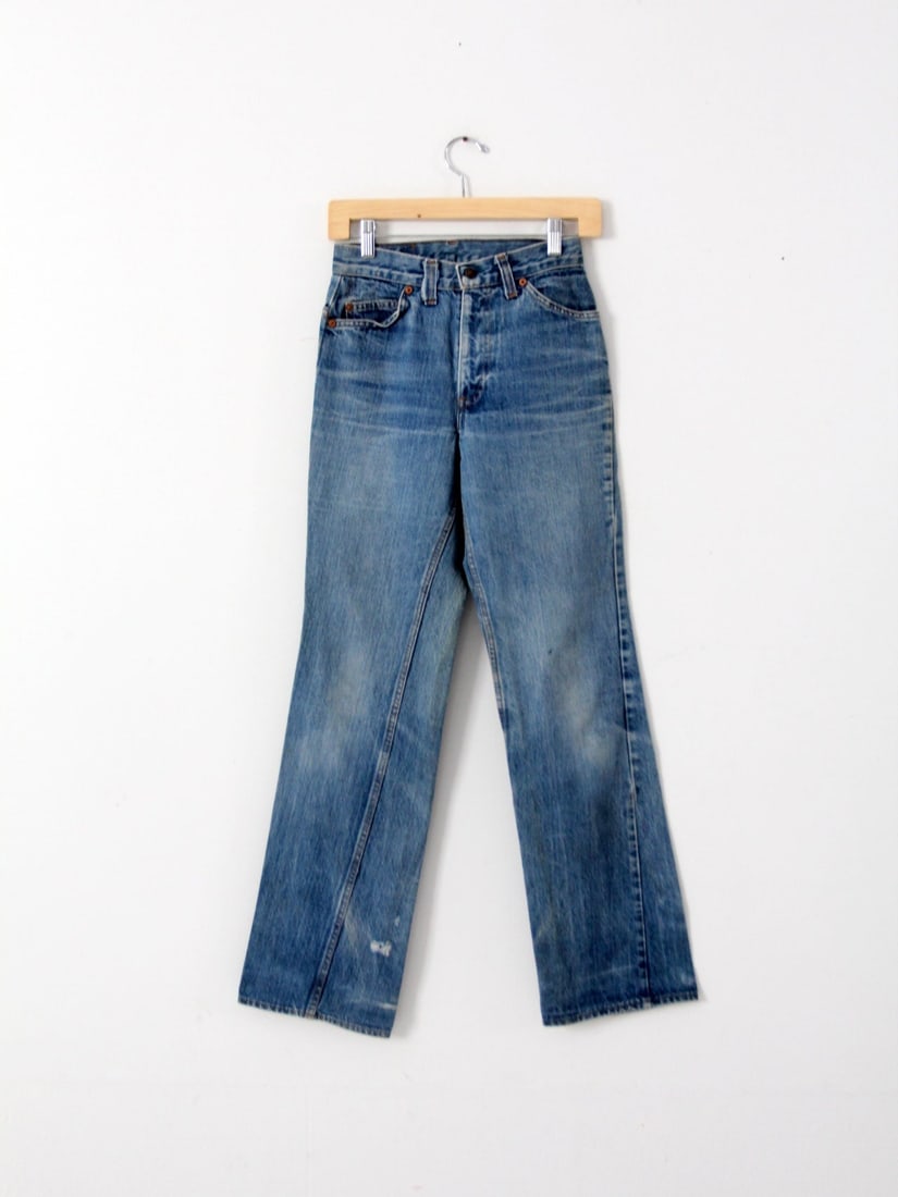 1960s Vintage Levi's Women's Jeans Style 26016 217 Orange Tab: 1960s Vintage Levi's Women's Jeans Style 26016 217 Orange Tab Step back in time with these authentic 1960s vintage Levi's women's jeans, perfect for adding a classic touch to your wardrobe. Featuring