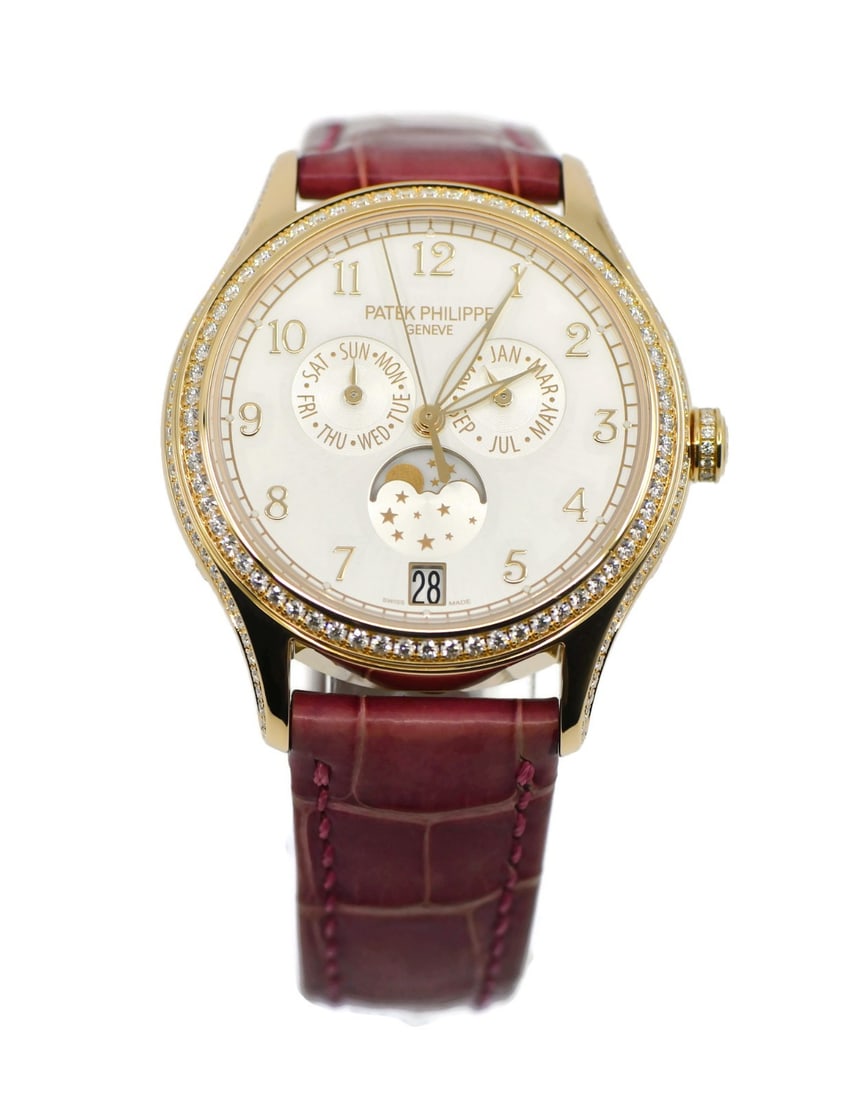Patek Philippe Annual Calendar 18K Rose Gold Diamond Watch 4947R: Patek Philippe Annual Calendar 18K Rose Gold Diamond Watch 4947R This exquisite Patek Philippe Annual Calendar watch combines sophistication with functionality. Crafted from 18K rose gold, it