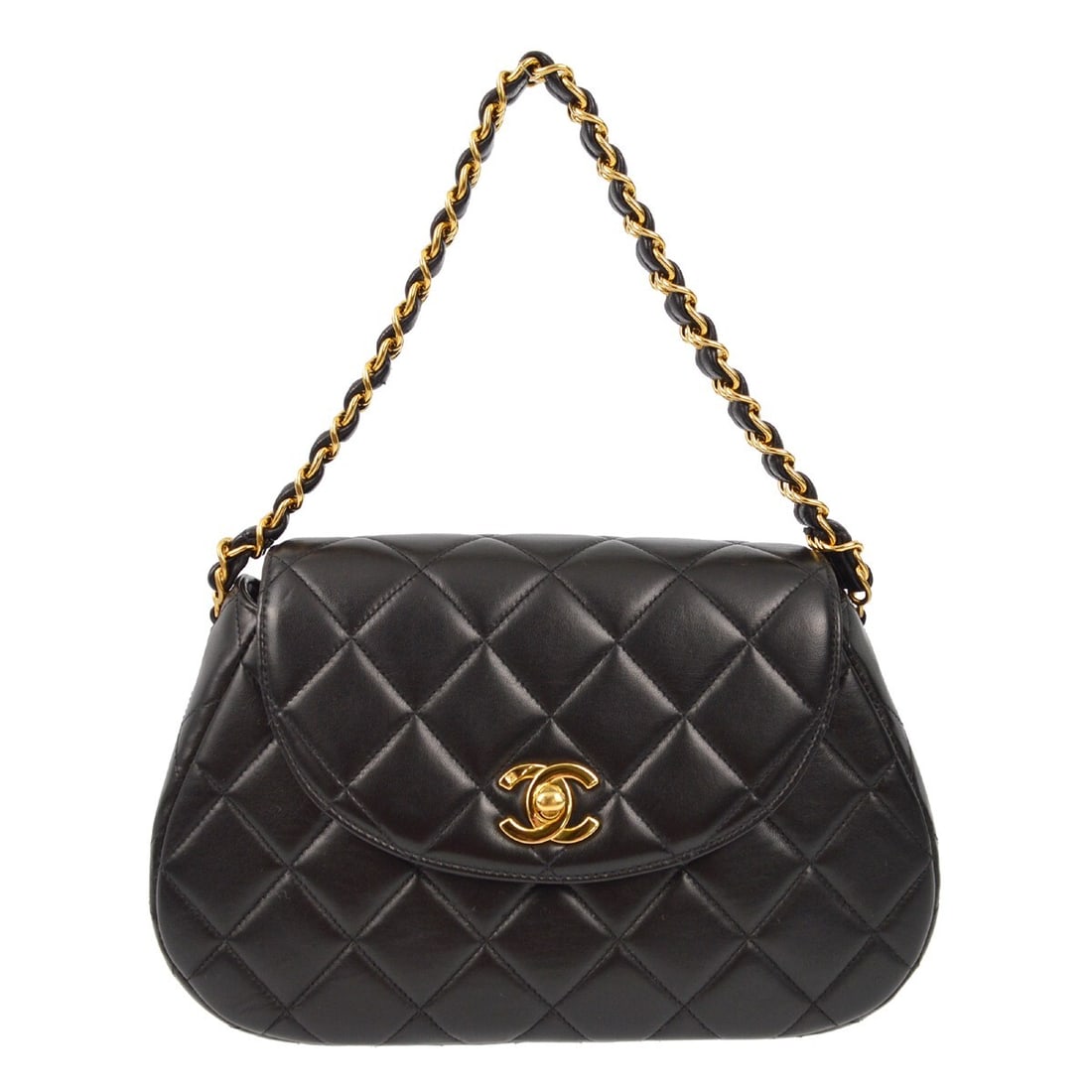 Chanel Quilted Small Top Handle Bag in Black Lambskin: Chanel Quilted Small Top Handle Bag in Black Lambskin Small Chanel top handle handbag crafted in black lambskin leather with a turn-lock closure and chain-accented handle. The bag features a black
