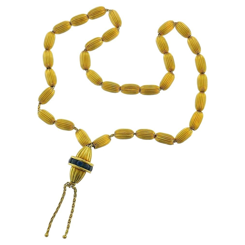 33 Bead Islamic Prayer Strand in 22k Gold with Blue Sapphires: 33 Bead Islamic Prayer Strand in 22k Gold with Blue Sapphires Vintage Islamic prayer beads made of 22k textured yellow gold and accented with eleven round faceted blue sapphires totaling 0.90 carat. T