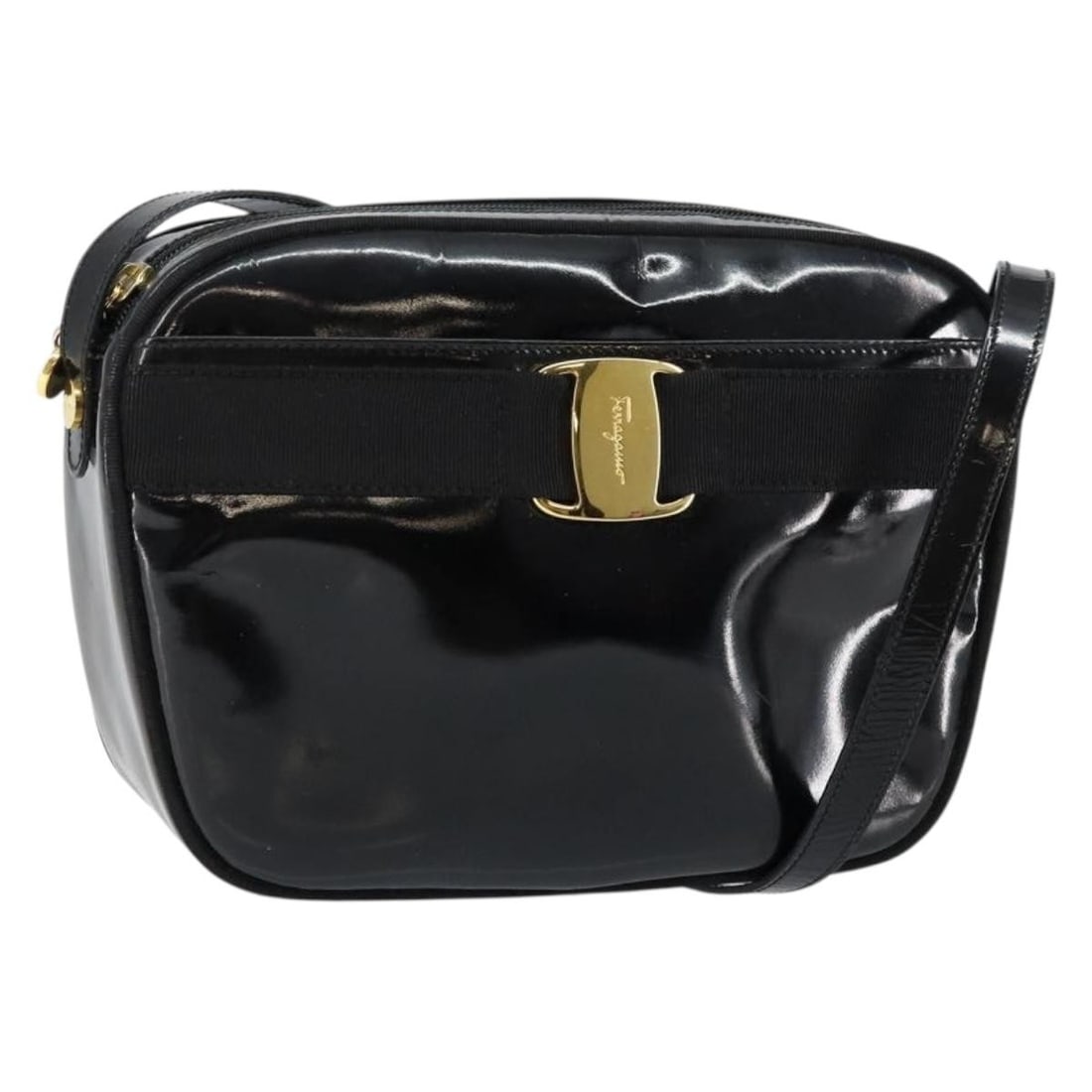 Black Patent Leather Shoulder Bag Salvatore Ferragamo Vala: Black Patent Leather Shoulder Bag Salvatore Ferragamo Vala This Salvatore Ferragamo Vala Shoulder Bag is crafted from black patent leather, designed for women. It features a structured silhouette with
