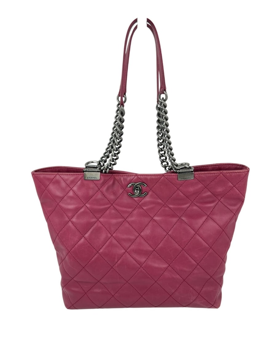 CHANEL In Chains Burgundy Quilted Leather Tote Bag: CHANEL In Chains Burgundy Quilted Leather Tote Bag This Chanel Shopping in Chains tote bag features a quilted leather exterior in a rich burgundy color with a distinctive argyle/diamond pattern. It is