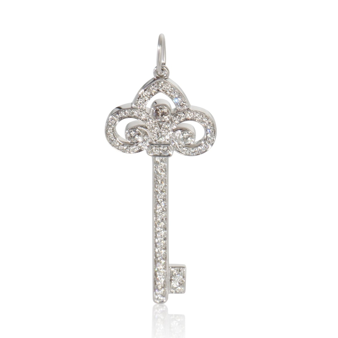 Platinum Key Pendant with Diamonds Fluer De Lis Collection by Tiffany & Co.: Platinum Key Pendant with Diamonds Fluer De Lis Collection by Tiffany & Co. This Tiffany & Co. Fluer De Lis Key pendant is crafted from platinum and features round brilliant diamonds with a total cara