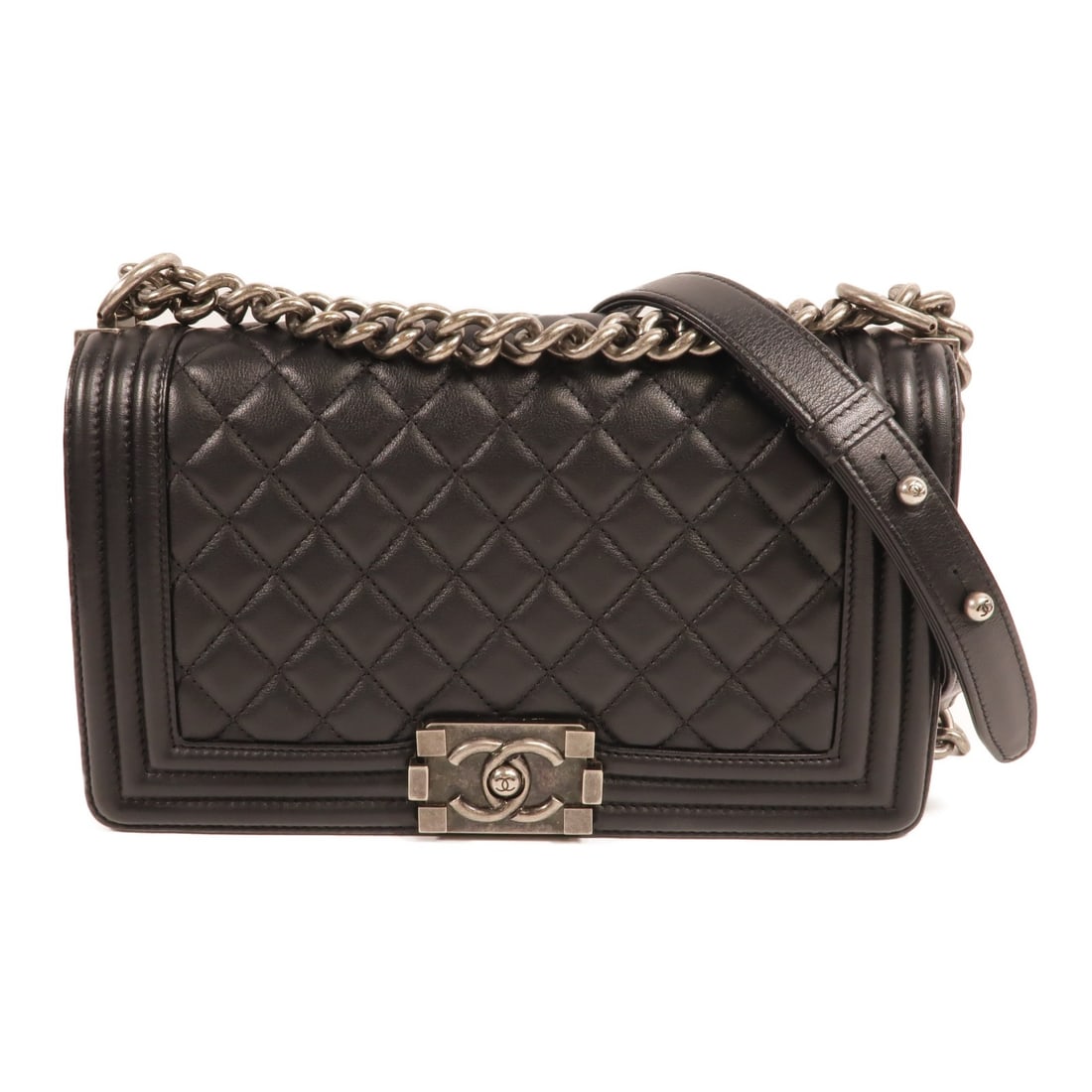 CHANEL Boy 25 CC Lambskin Shoulder Bag in Black: CHANEL Boy 25 CC Lambskin Shoulder Bag in Black CHANEL Boy 25 shoulder bag in black lambskin leather with a chain shoulder strap. This women's bag features a flap design with one open interior pocket 