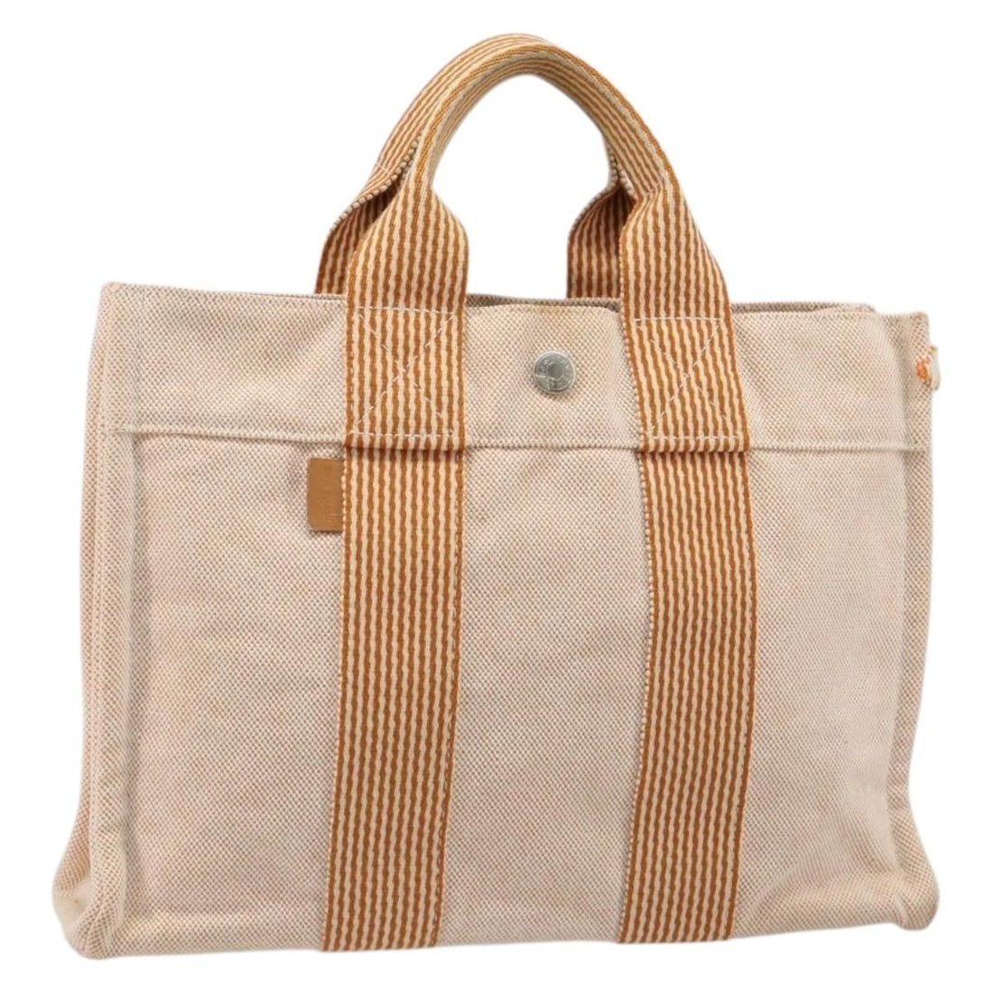 Hermes Fourre Tout PM Orange Canvas Handbag Silver Tone: Hermes Fourre Tout PM Orange Canvas Handbag Silver Tone This Hermes Fourre Tout PM hand bag is crafted from canvas in an orange and silver color combination. It is made in France and comes in Rank B c
