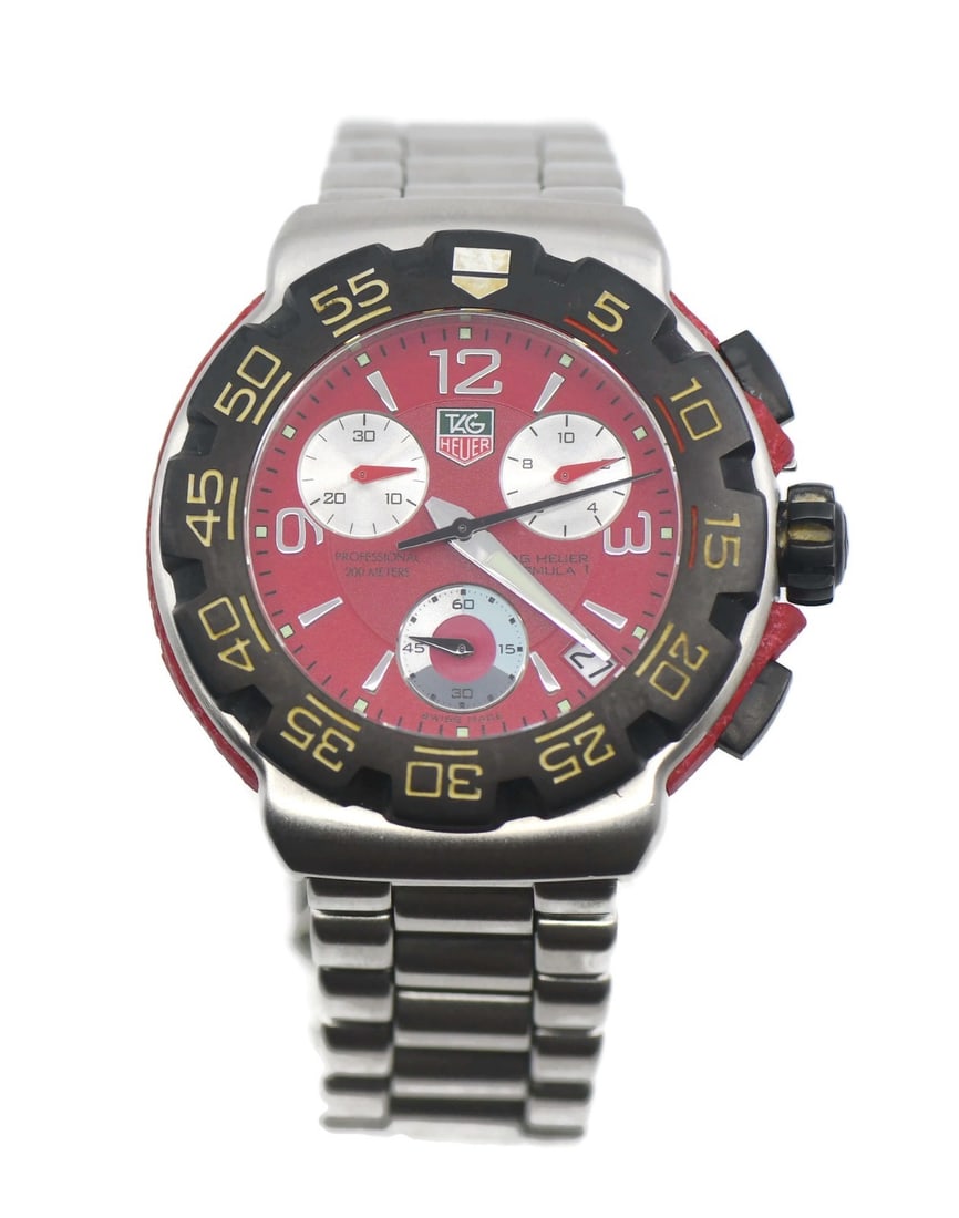 TAG Heuer Formula 1 Chronograph Wristwatch CAC1112 Steel Bracelet: TAG Heuer Formula 1 Chronograph Wristwatch CAC1112 Steel Bracelet Pre-owned TAG Heuer Formula 1 wristwatch with a stainless steel case and bracelet. This men's sport watch features a red analog dial, 