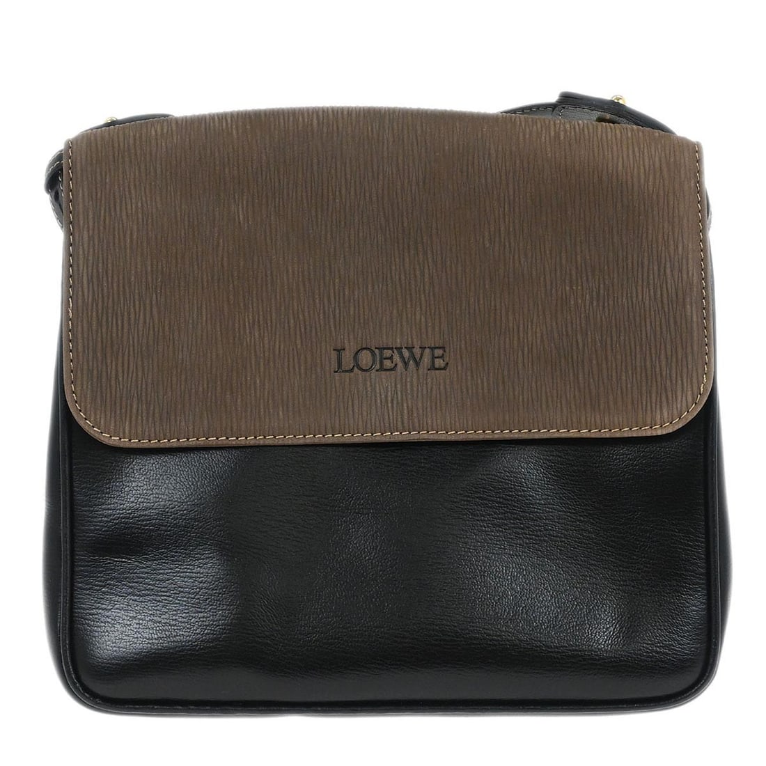 Loewe Velasquez medium shoulder bag in black and brown leather: Loewe Velasquez medium shoulder bag in black and brown leather Loewe Velasquez shoulder bag in leather with a magnetic closure and inner zip pocket. This medium women's bag is made in Spain and shows 