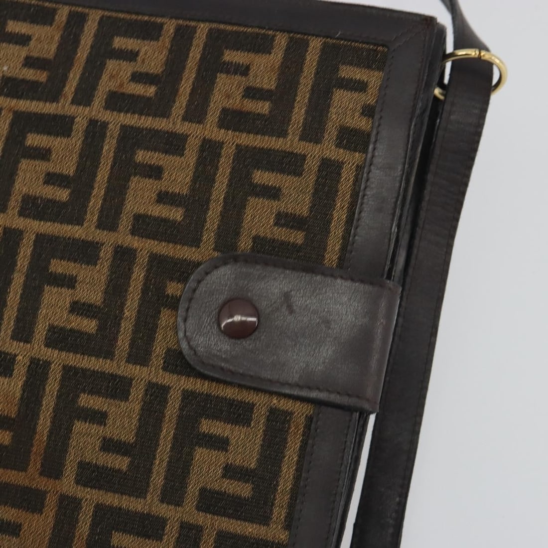 FENDI Brown Zucca Canvas Shoulder Bag Gold Tone Italy: FENDI Brown Zucca Canvas Shoulder Bag Gold Tone Italy Fendi shoulder bag in brown Zucca canvas with gold-tone accents. Includes a dust bag and one key. Made in Italy. Condition is heavily used, showin