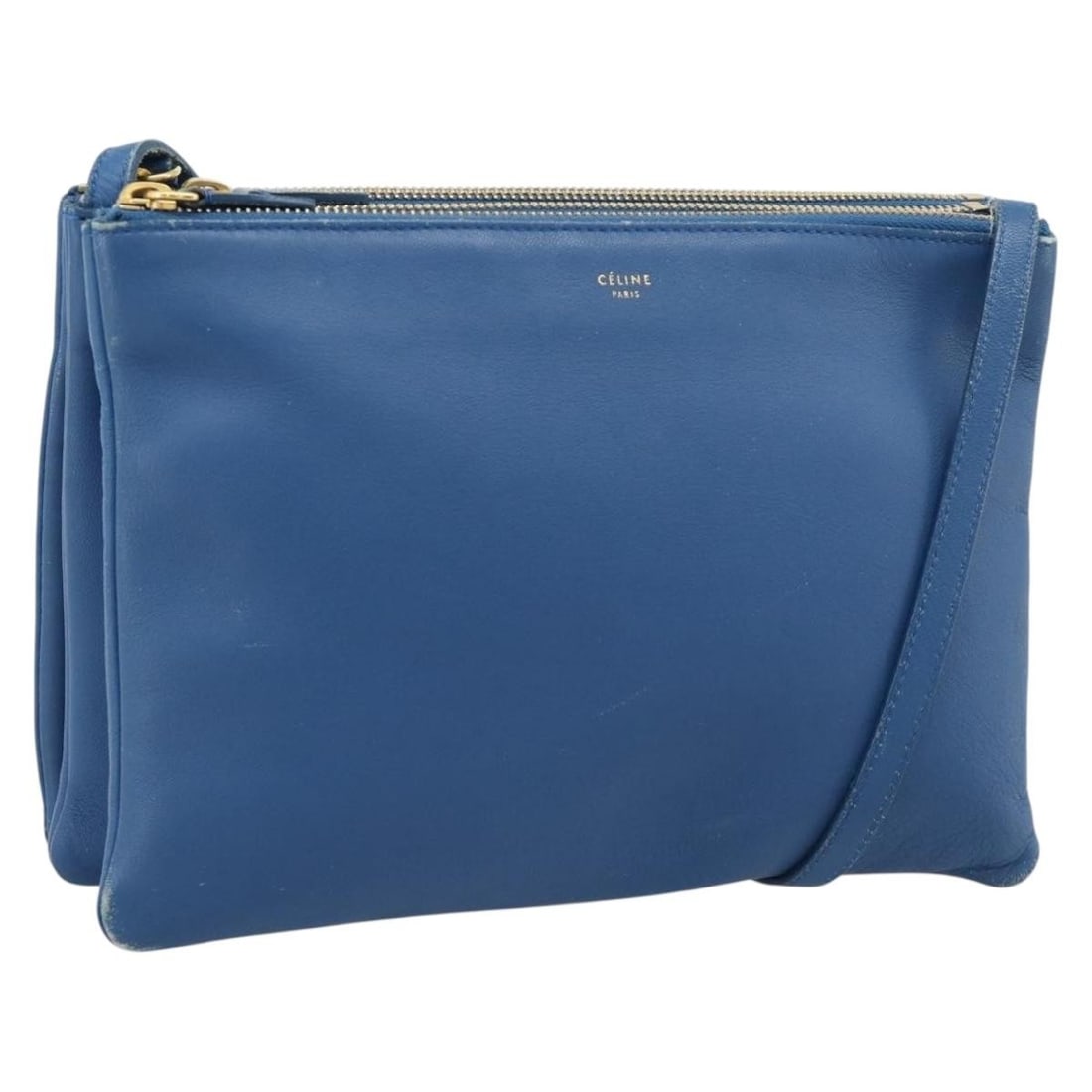 CELINE Trio Blue Leather Shoulder Bag Gold Tone Hardware: CELINE Trio Blue Leather Shoulder Bag Gold Tone Hardware CELINE Trio Shoulder Bag in blue and gold leather, made in Italy. This women's shoulder bag measures approximately 24 cm wide, 18 cm high, and 